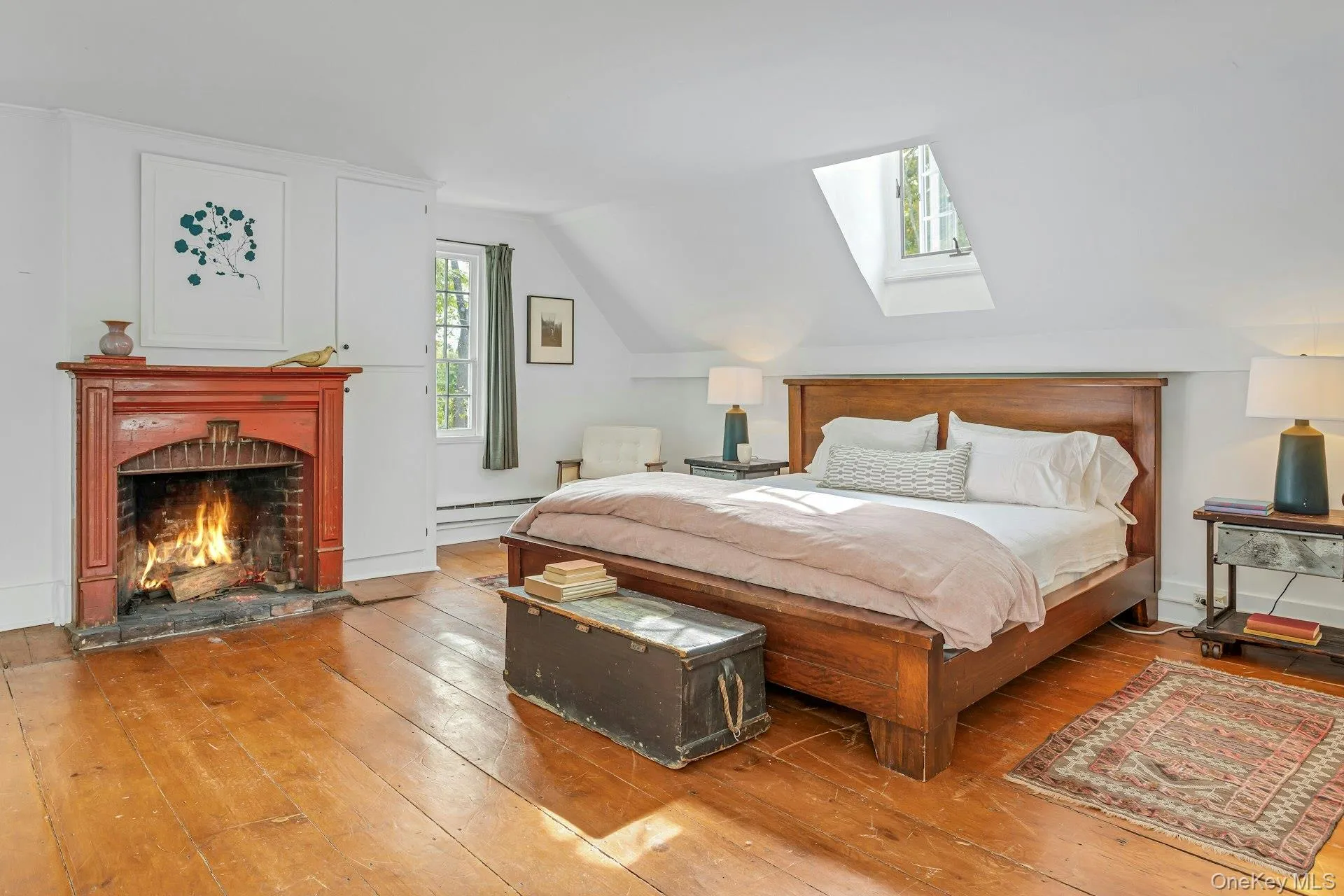 Large primary bedroom w/skylight, large windows and fireplace Large primary bedroom w/skylight, large windows and fireplace