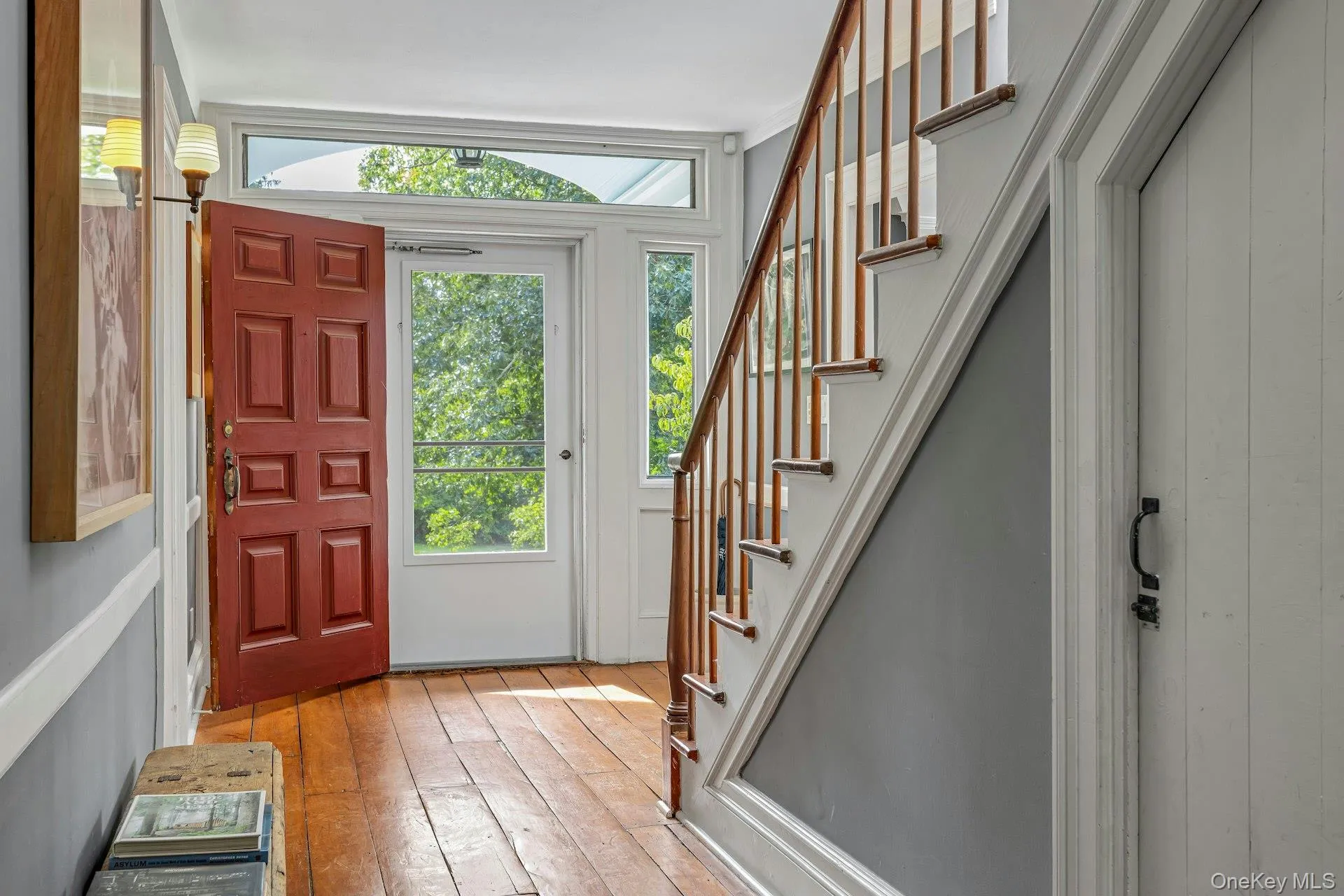Graciously sized foyer/gallery. Stairs to second level Graciously sized foyer/gallery. Stairs to second level