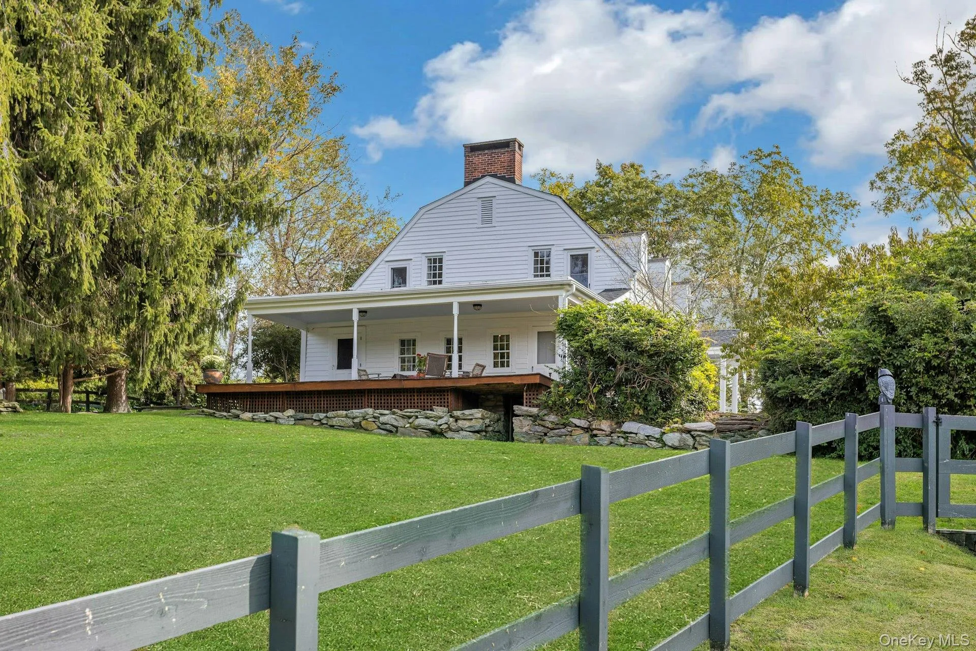 Circa 1795 Dutch Colonial Farmhouse on a country road w/farms on either side. Circa 1795 Dutch Colonial Farmhouse on a country road w/farms on either side.