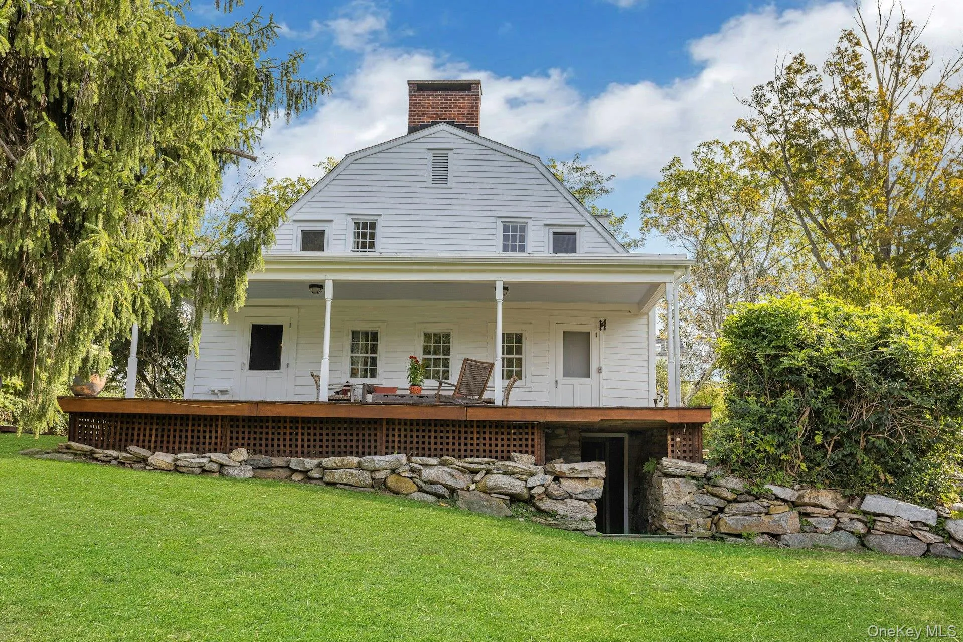 Expansive covered porch overlooking breath-taking property Expansive covered porch overlooking breath-taking property
