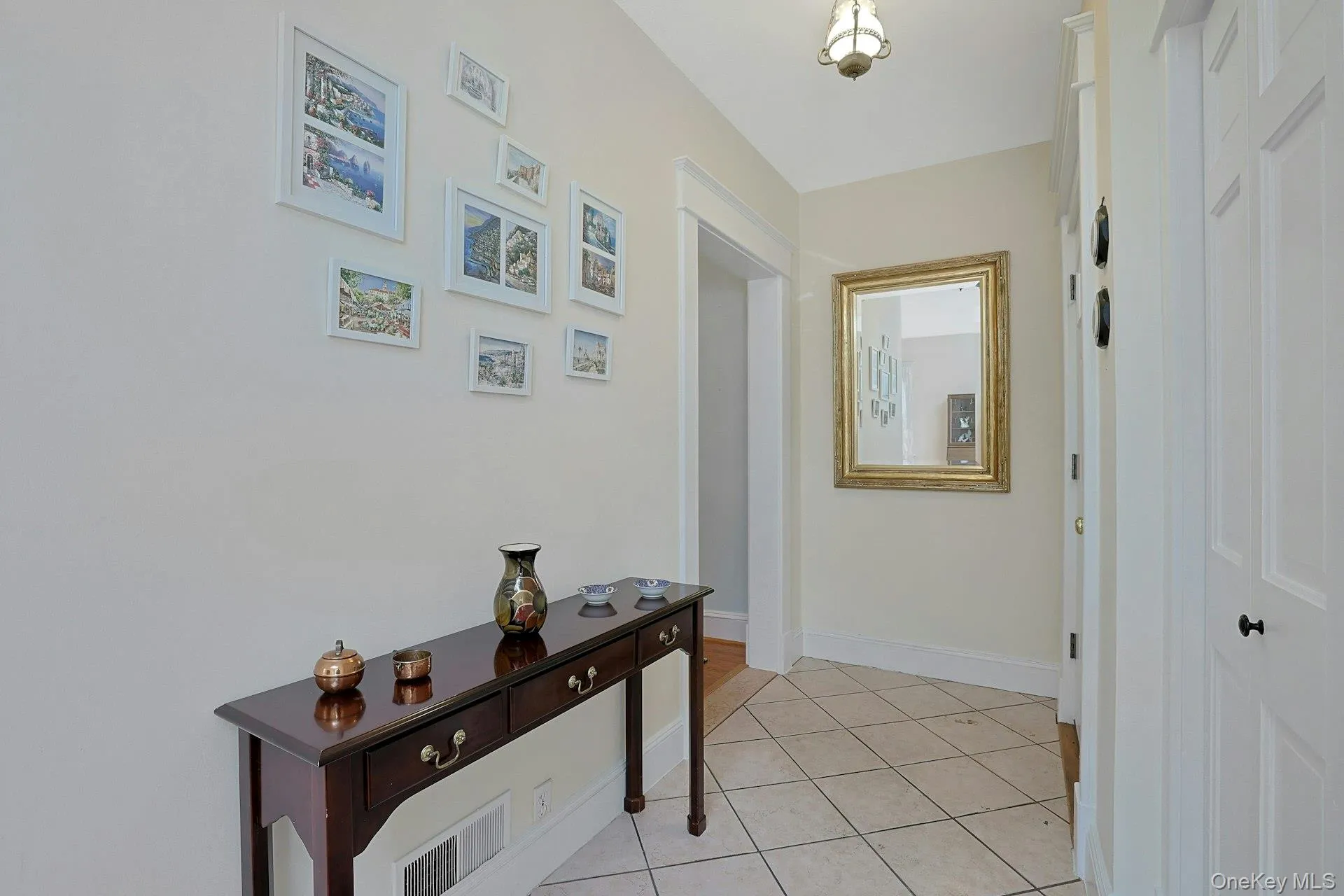 Lovely foyer with large coat closet Lovely foyer with large coat closet