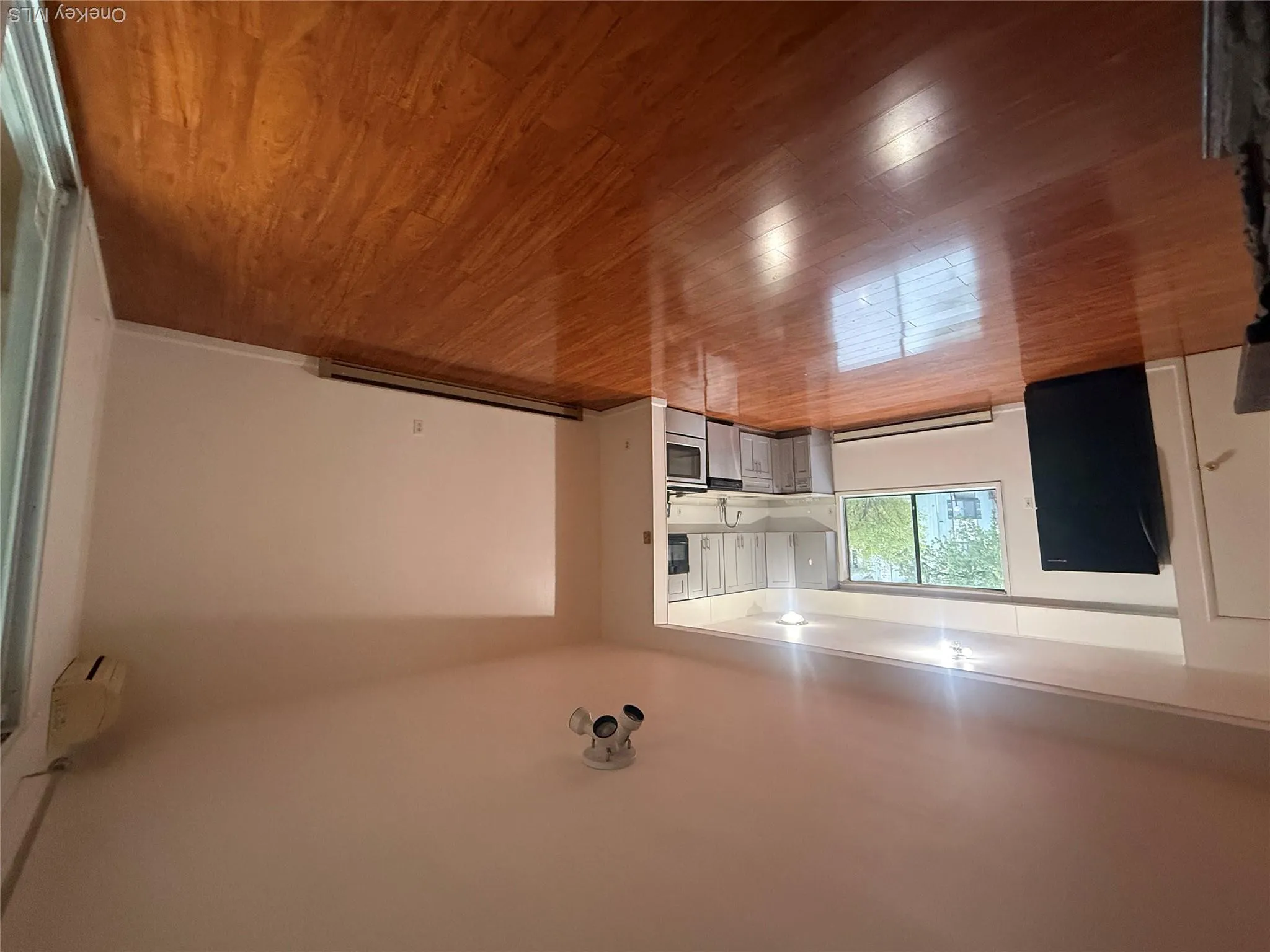 Gleaming wood floors and an open floor plan Gleaming wood floors and an open floor plan
