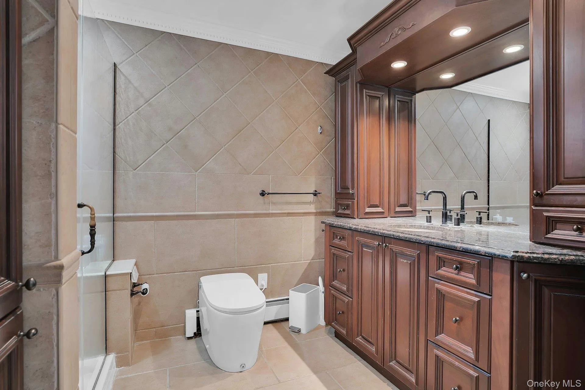 Custom cabinets, granite counters and big shower. Custom cabinets, granite counters and big shower.