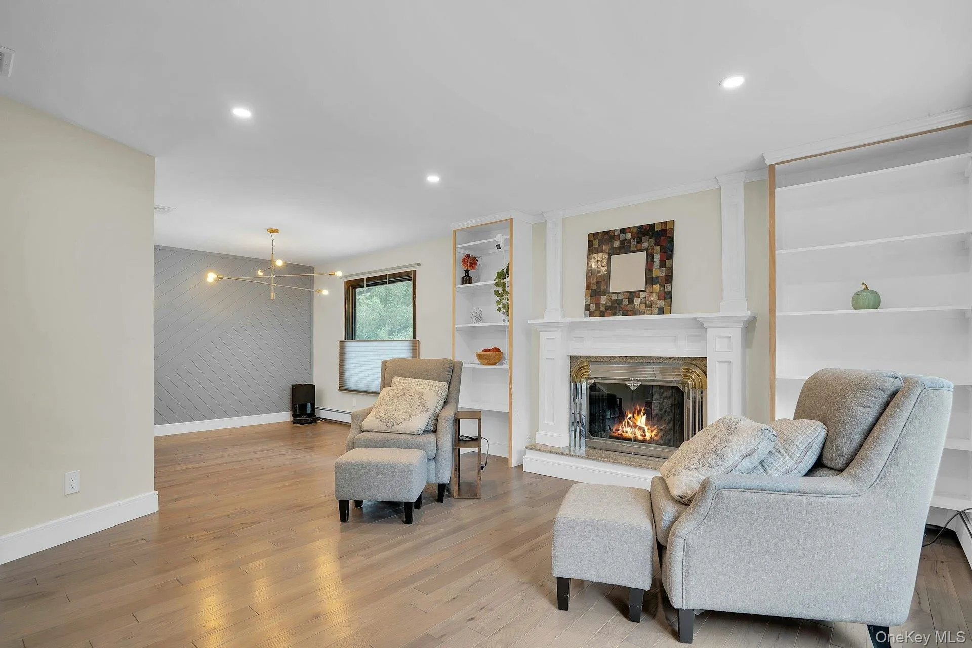 Beautiful fireplace with built-in shelving. Beautiful fireplace with built-in shelving.