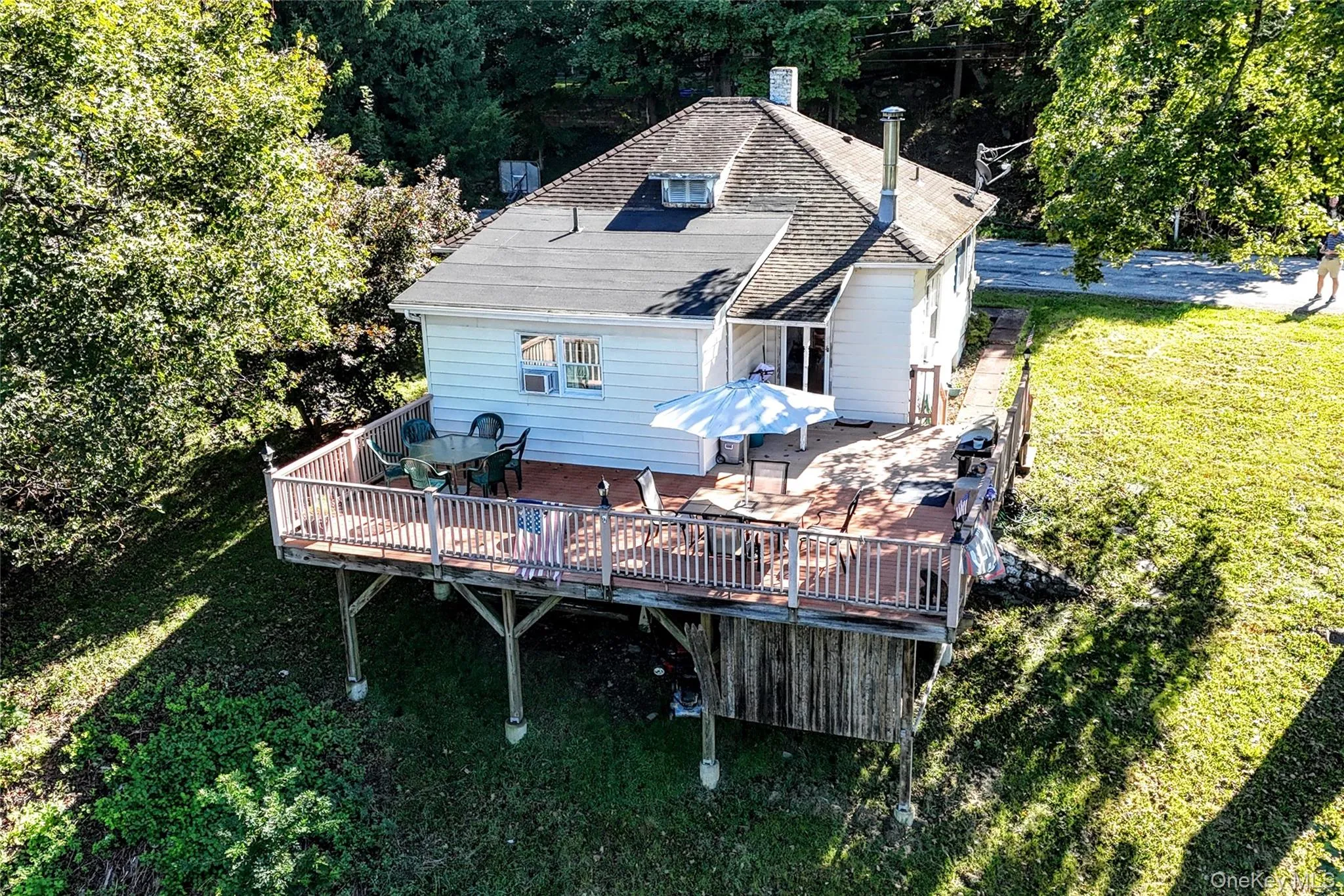 Aerial of house, deck and yard Aerial of house, deck and yard