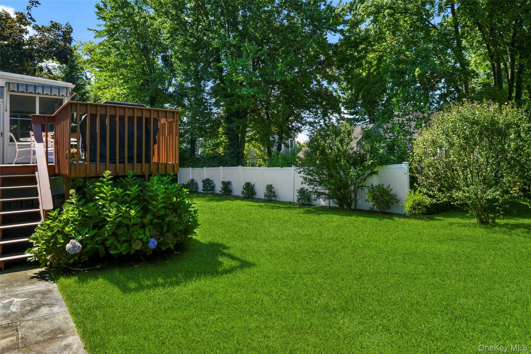 Beautiful backyard easily accessed by deck or lower level family room Beautiful backyard easily accessed by deck or lower level family room