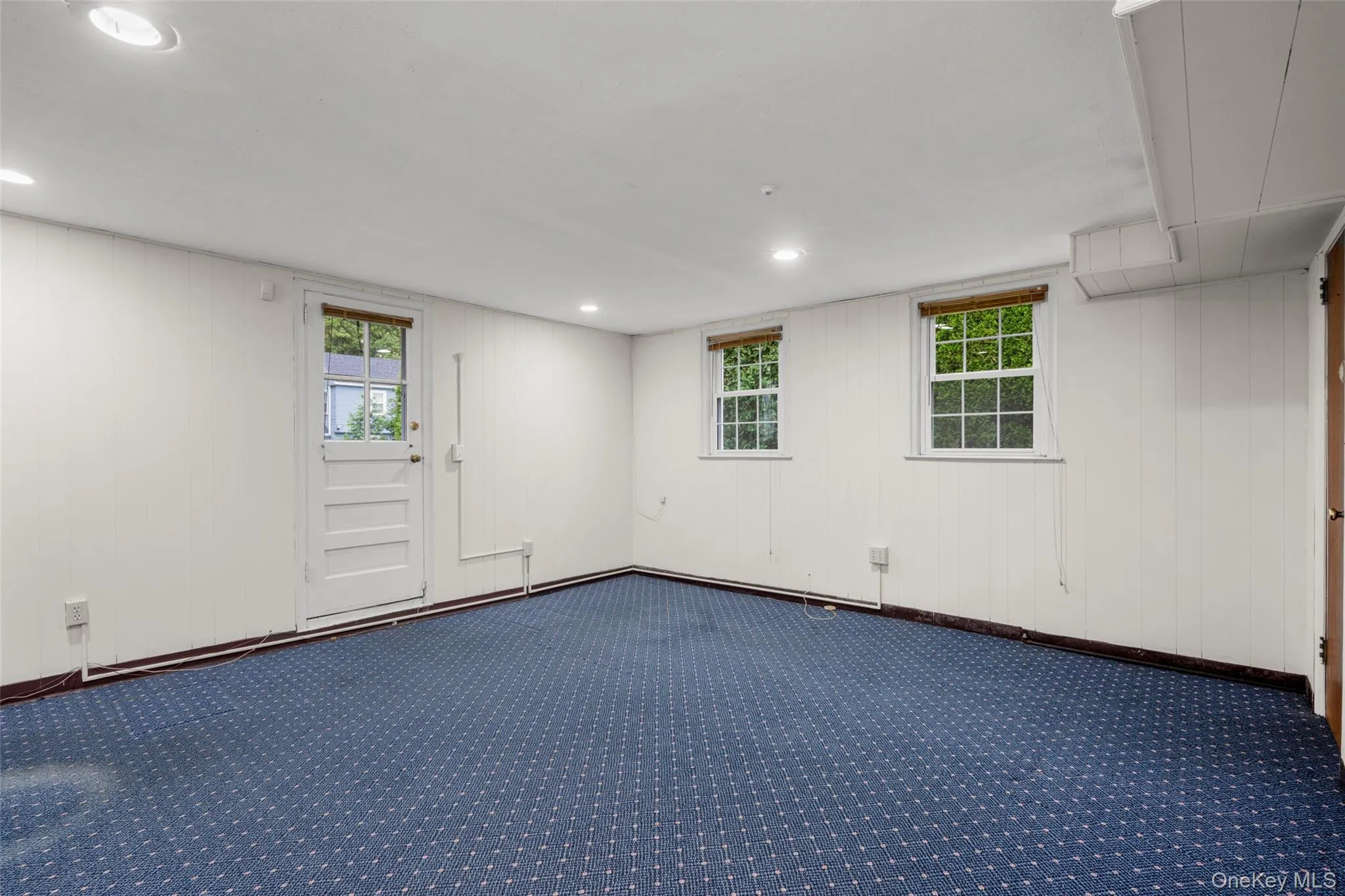 just a few steps down from main floor - this garden level room has door to backyard and ideal for media, recreation room or playroom just a few steps down from main floor - this garden level room has door to backyard and ideal for media, recreation room or playroom