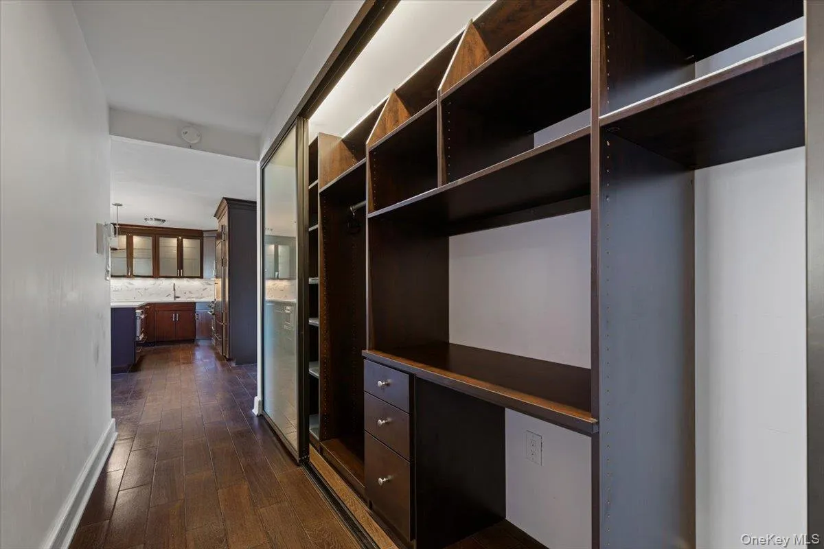Custom multi function built-ins closets includes a desk/work area perfect for home office Custom multi function built-ins closets includes a desk/work area perfect for home office