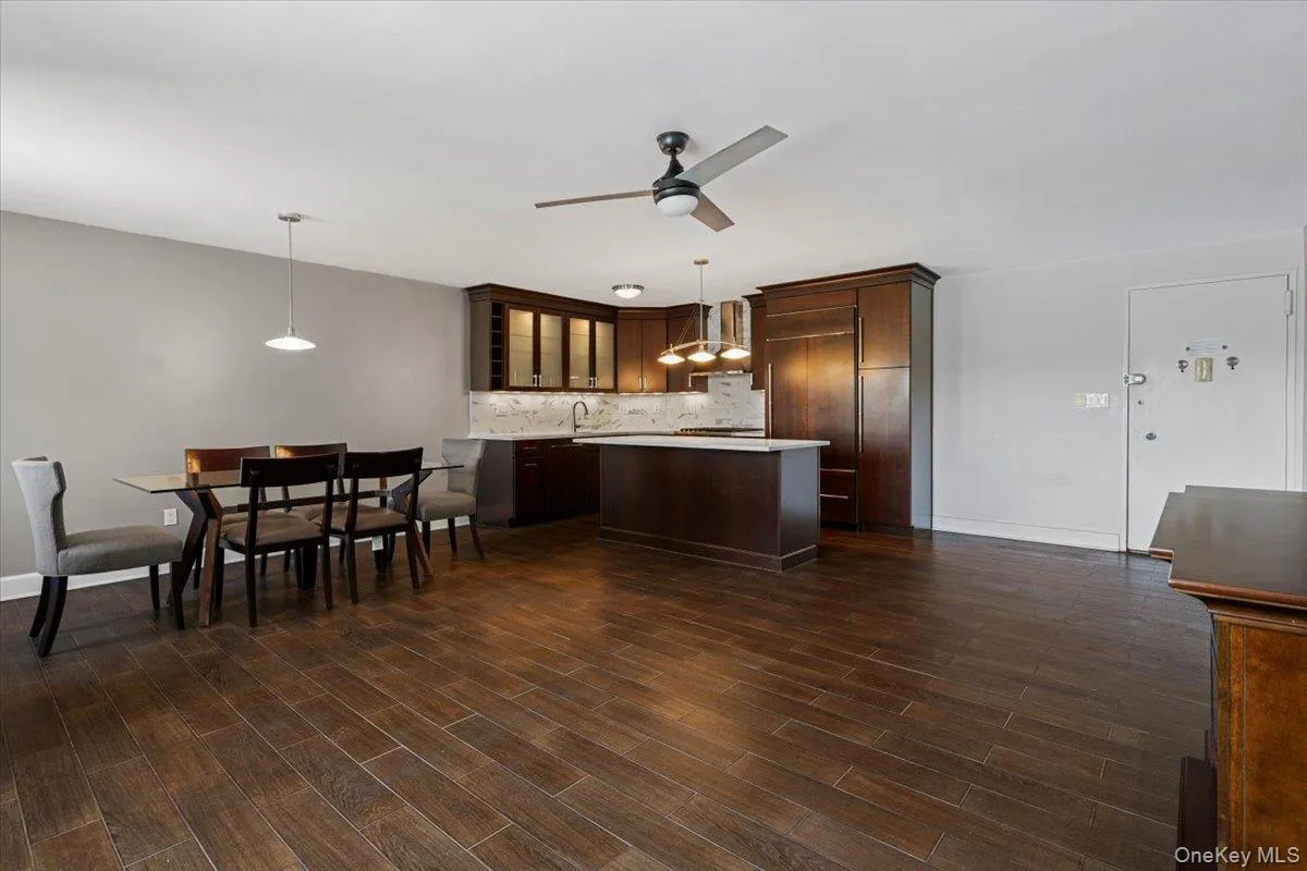Kitchen open to separate dining area Kitchen open to separate dining area