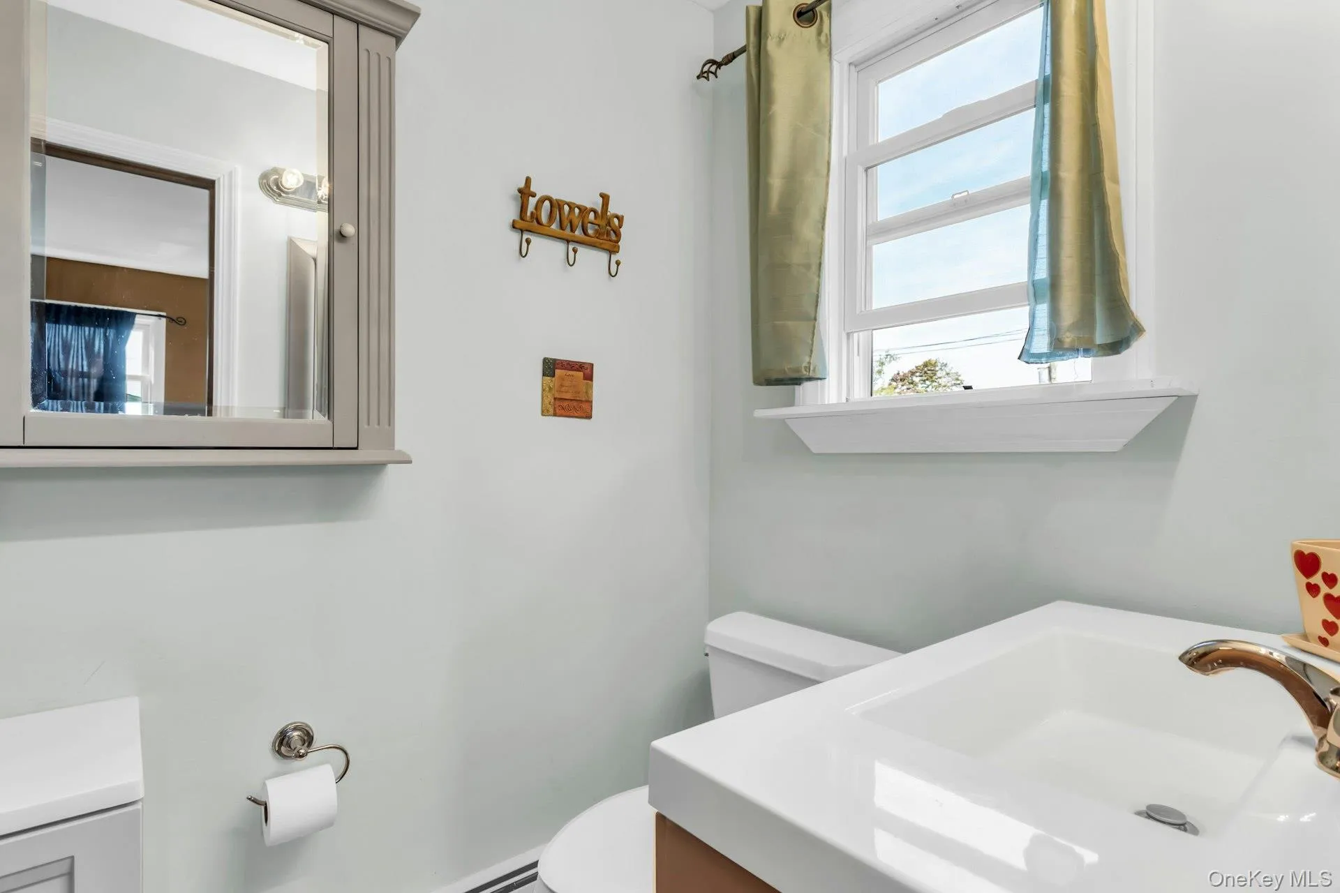 White single-pane window with a white sill White single-pane window with a white sill