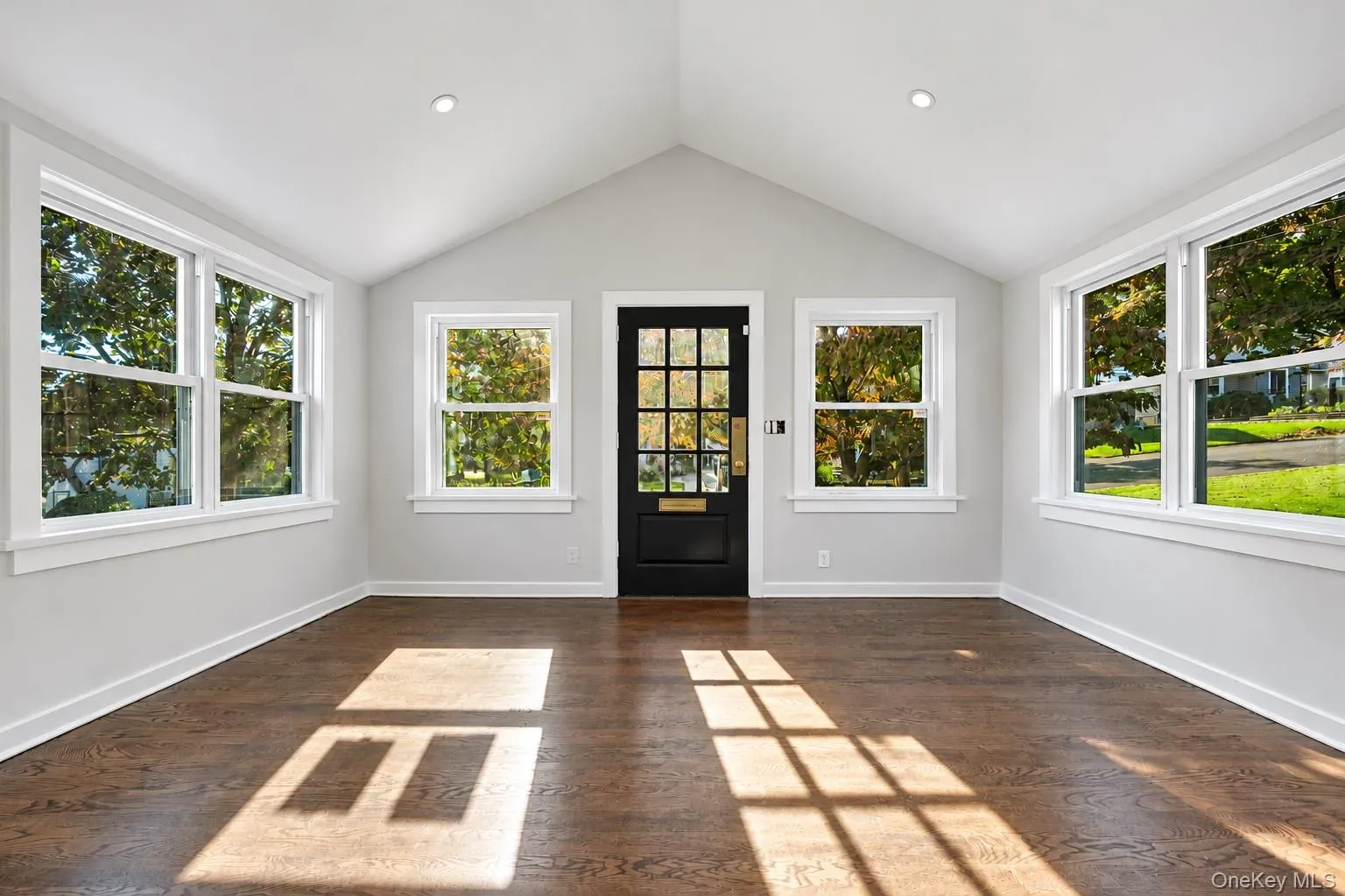 Sun room entrance with brand new hardwood floors Sun room entrance with brand new hardwood floors