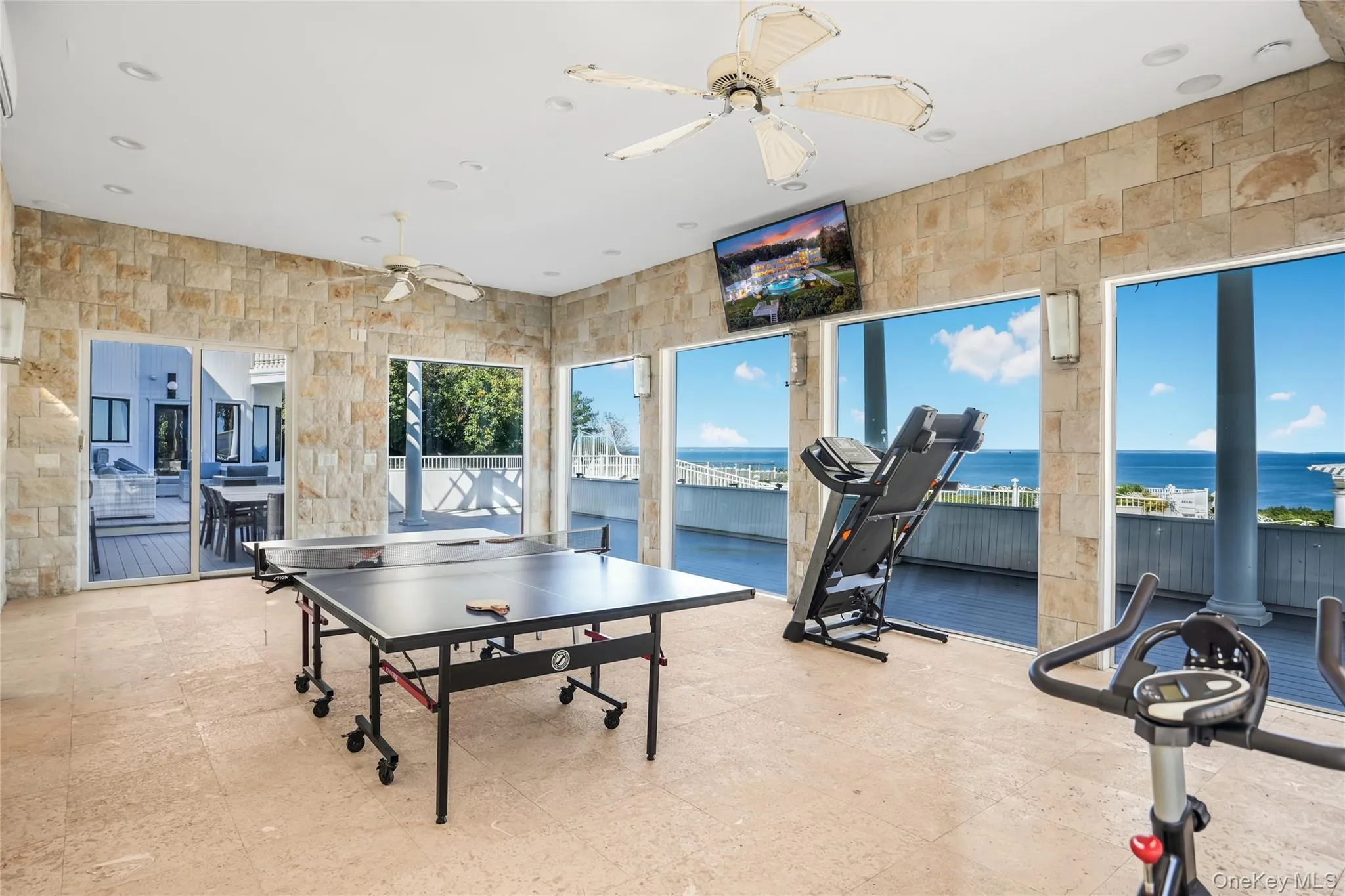 Game room and gym (digitally enhanced) Game room and gym (digitally enhanced)