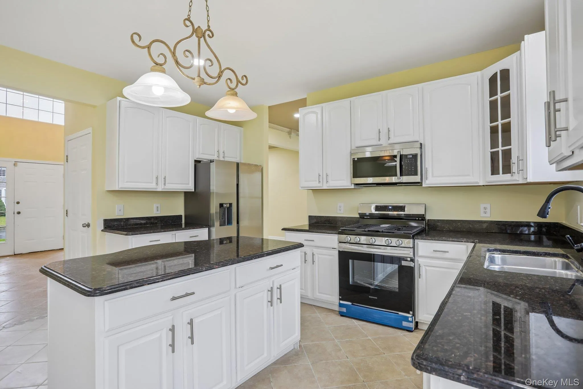 Granite countertops, wood cabinets with new hardware Granite countertops, wood cabinets with new hardware