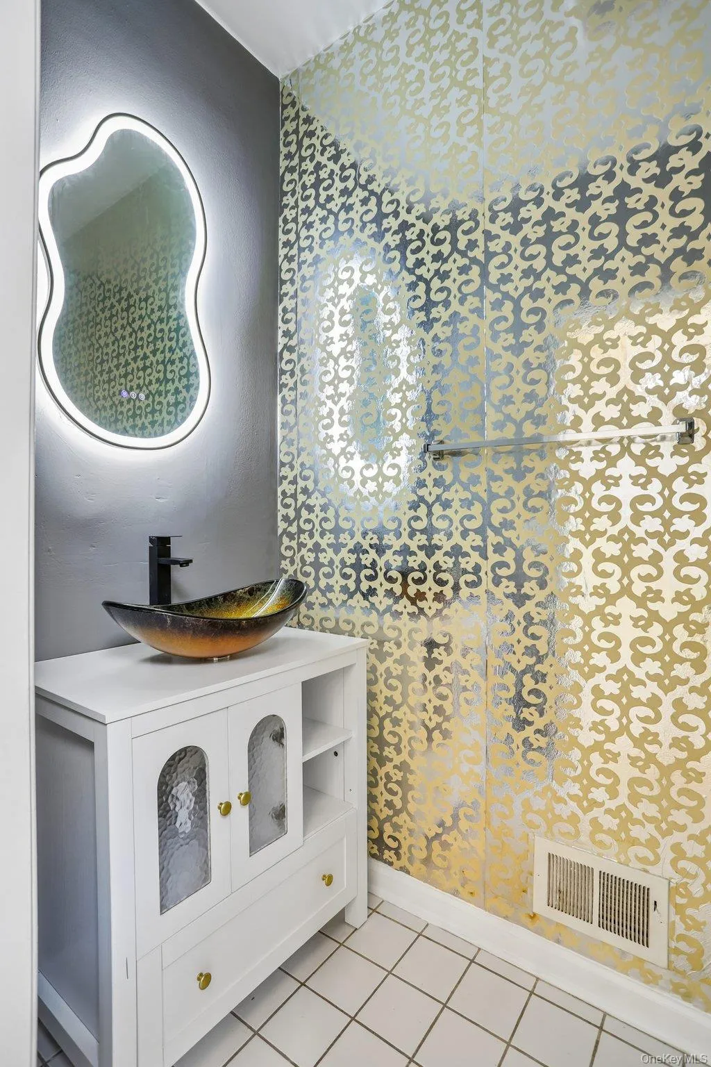 Powder room on the 1st floor with brand new sink, mirror and toilet Powder room on the 1st floor with brand new sink, mirror and toilet