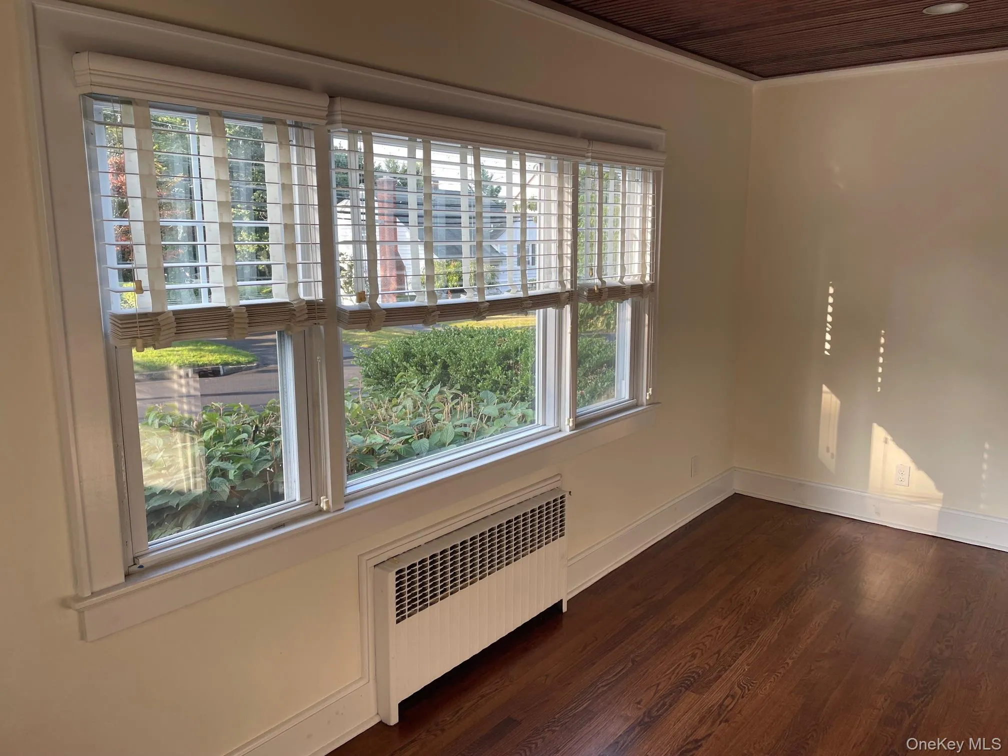 Office featuring dark wood flooring, and molding. Office featuring dark wood flooring, and molding.