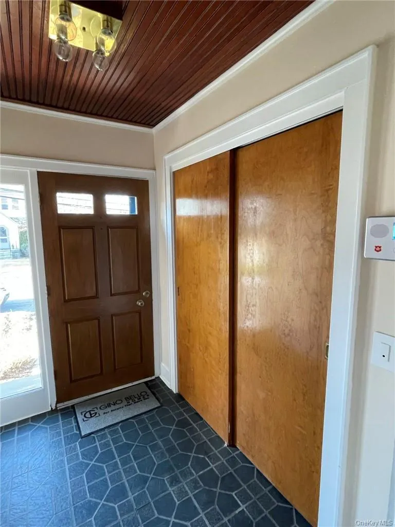 Entry and mud room with large closet Entry and mud room with large closet