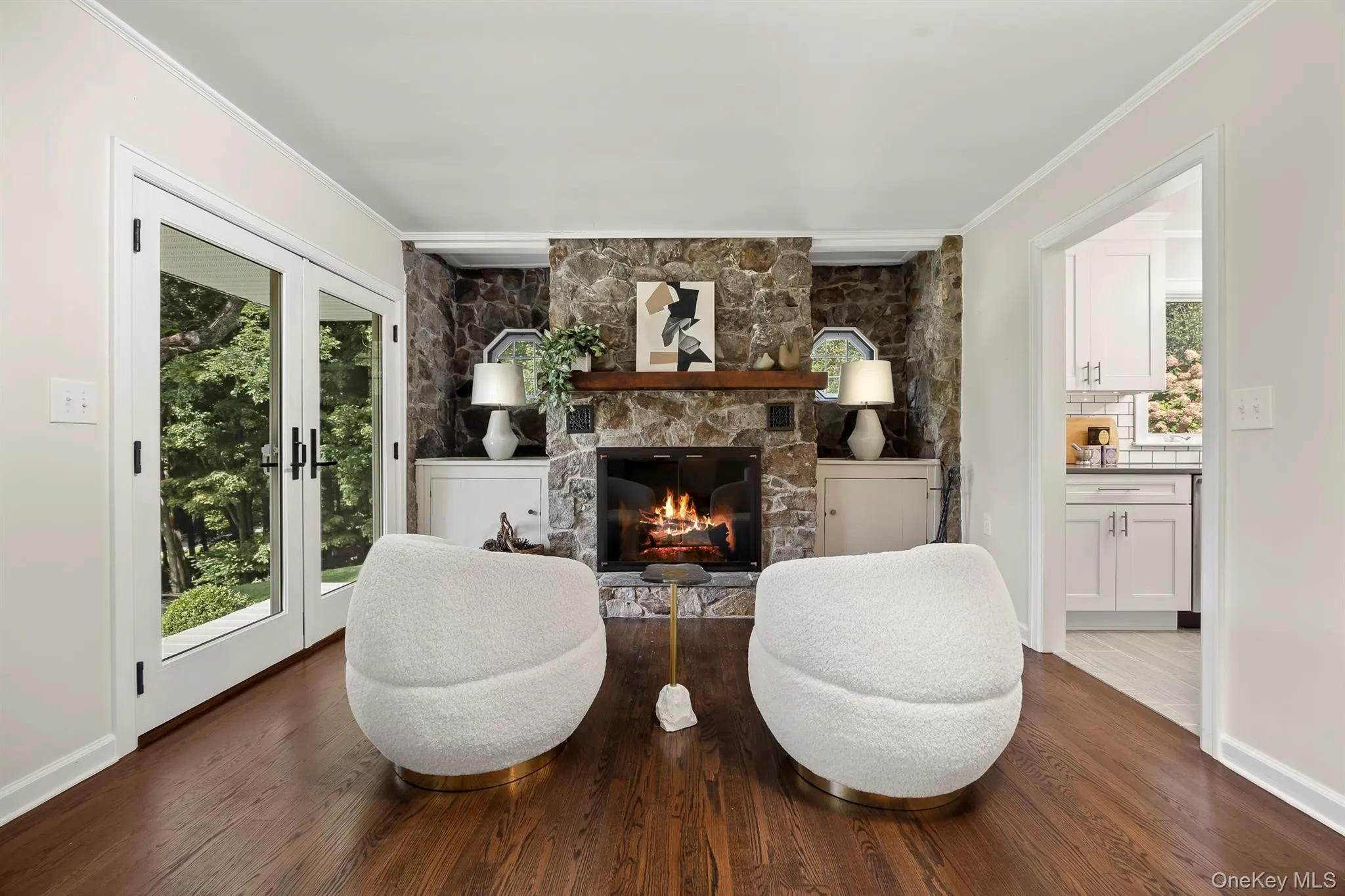 A fabulous stone patio frames a light-filled living room A fabulous stone patio frames a light-filled living room