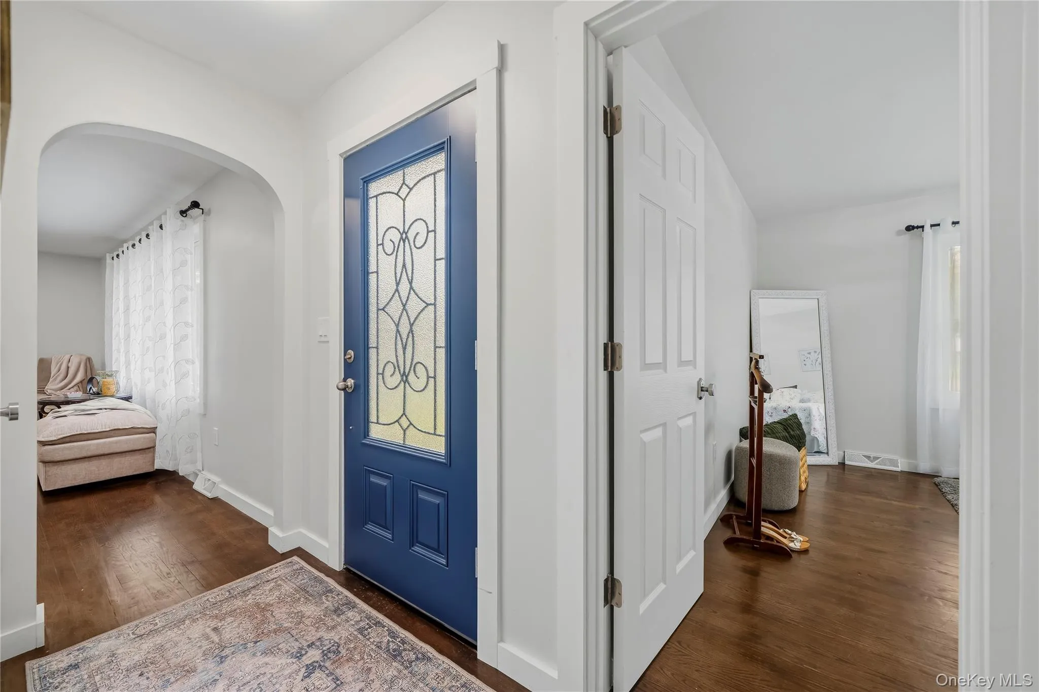 Living room to the left, primary bedroom to the right Living room to the left, primary bedroom to the right