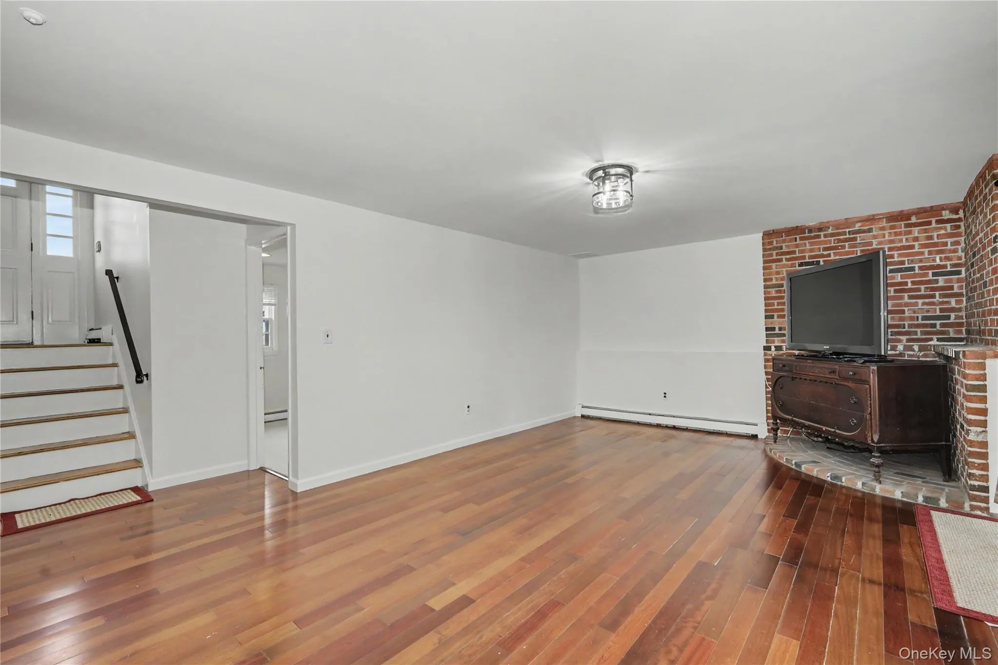 Huge family room with bricked platform for woodburning stove Huge family room with bricked platform for woodburning stove