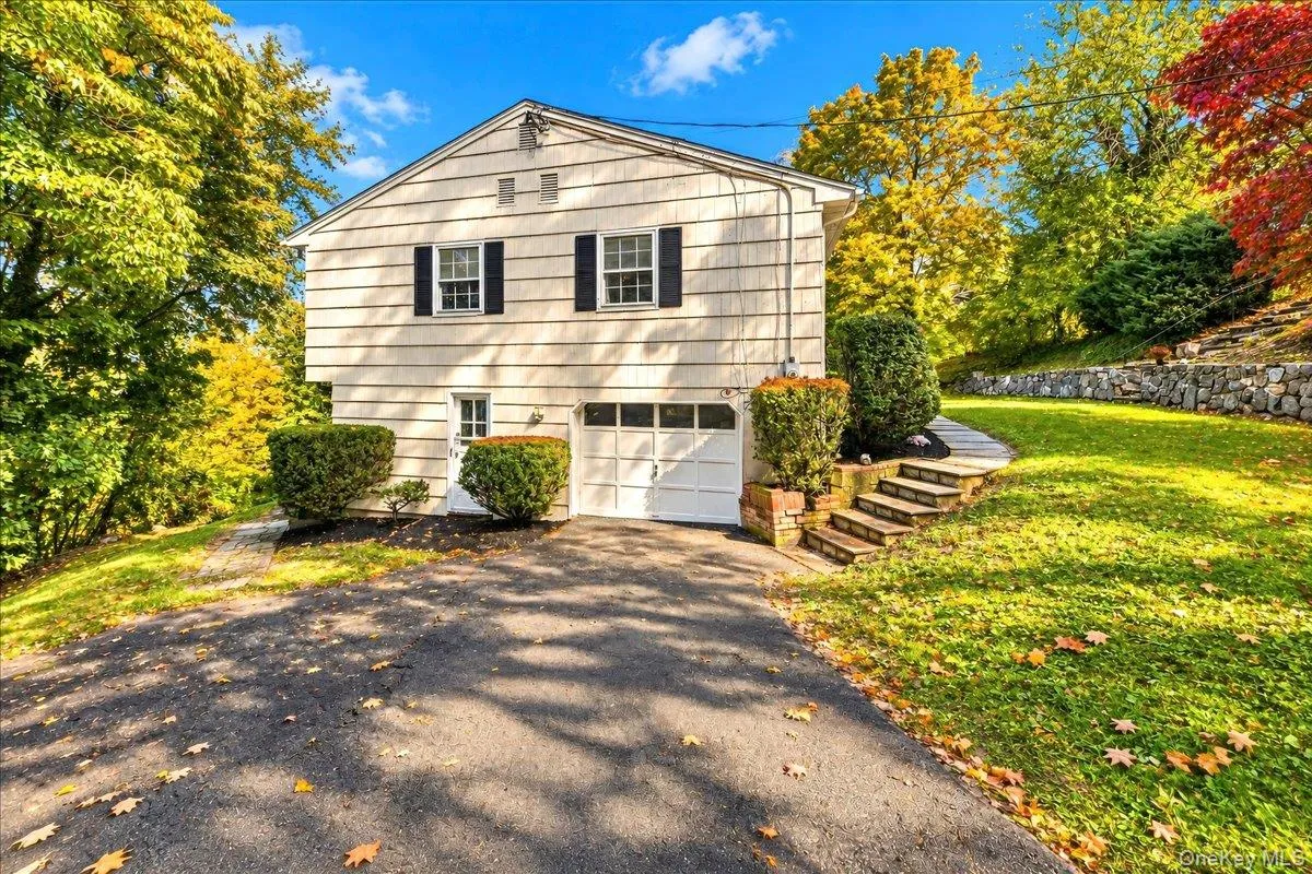 Convenient one-car garage with direct access to the lower level of the home. Convenient one-car garage with direct access to the lower level of the home.