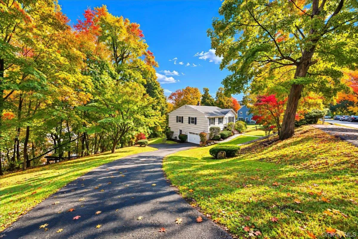Long driveway offering ample off-street parking and leading to the convenience of a one-car garage. Long driveway offering ample off-street parking and leading to the convenience of a one-car garage.