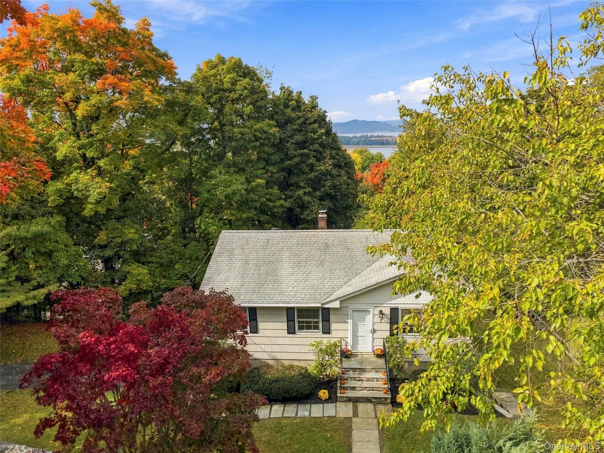 Front view of the home showcasing its charming exterior and beautiful Hudson River views. Front view of the home showcasing its charming exterior and beautiful Hudson River views.