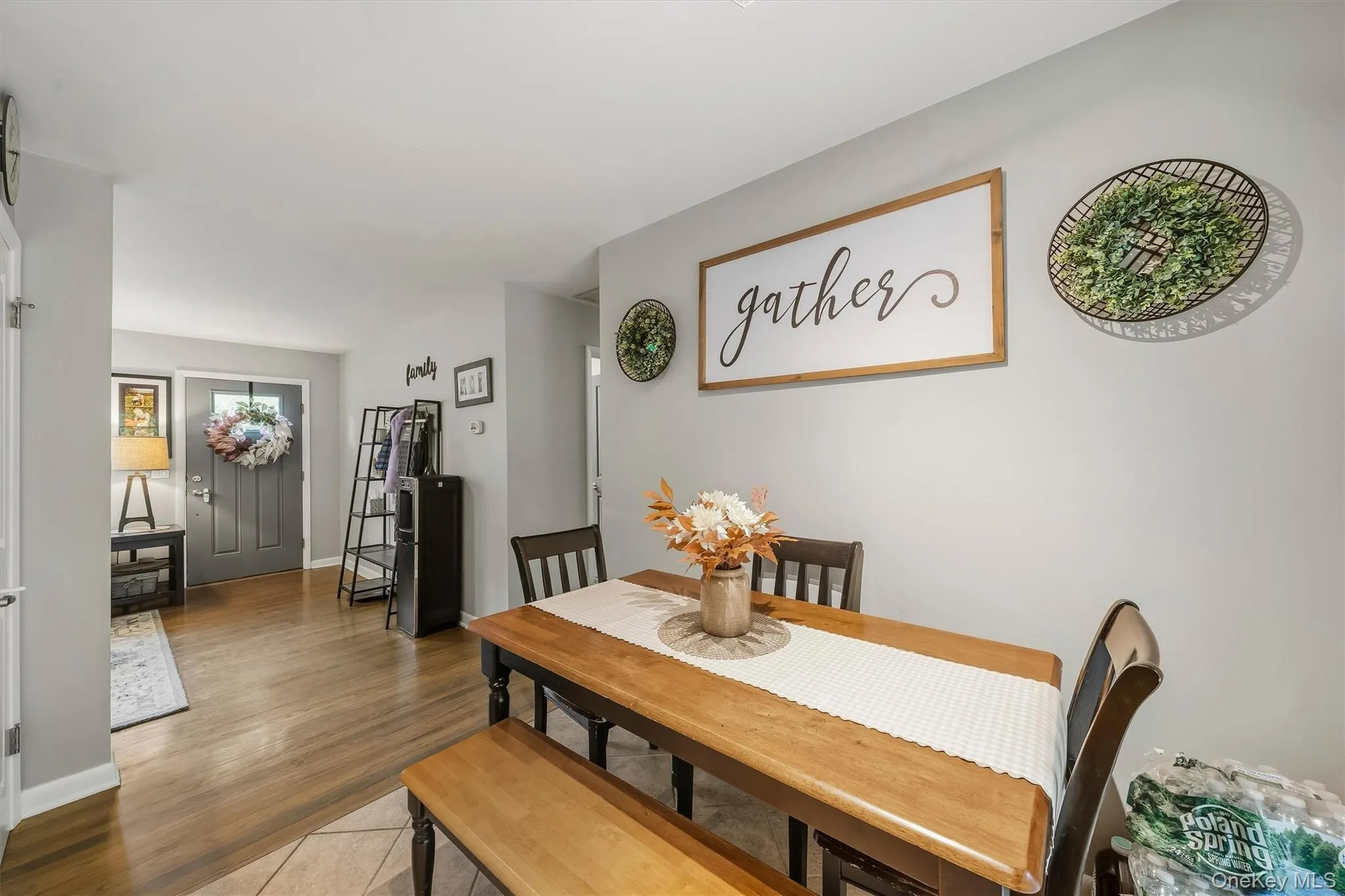Wood-finish flooring throughout, complemented by light gray wall paint Wood-finish flooring throughout, complemented by light gray wall paint
