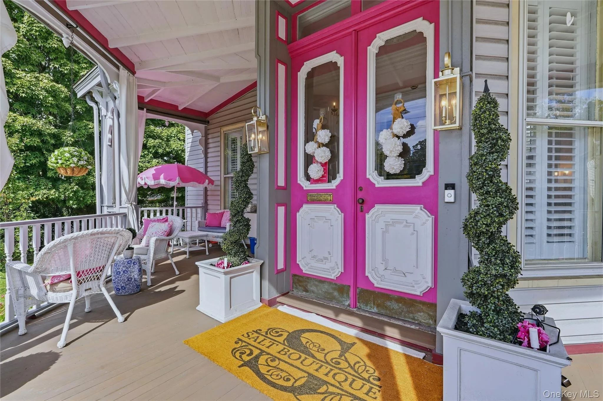 Covered front porch with wood flooring Covered front porch with wood flooring