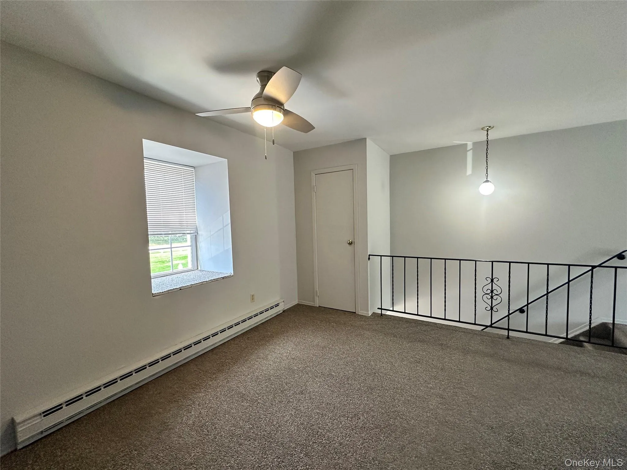 Carpet, overhead light, window Carpet, overhead light, window