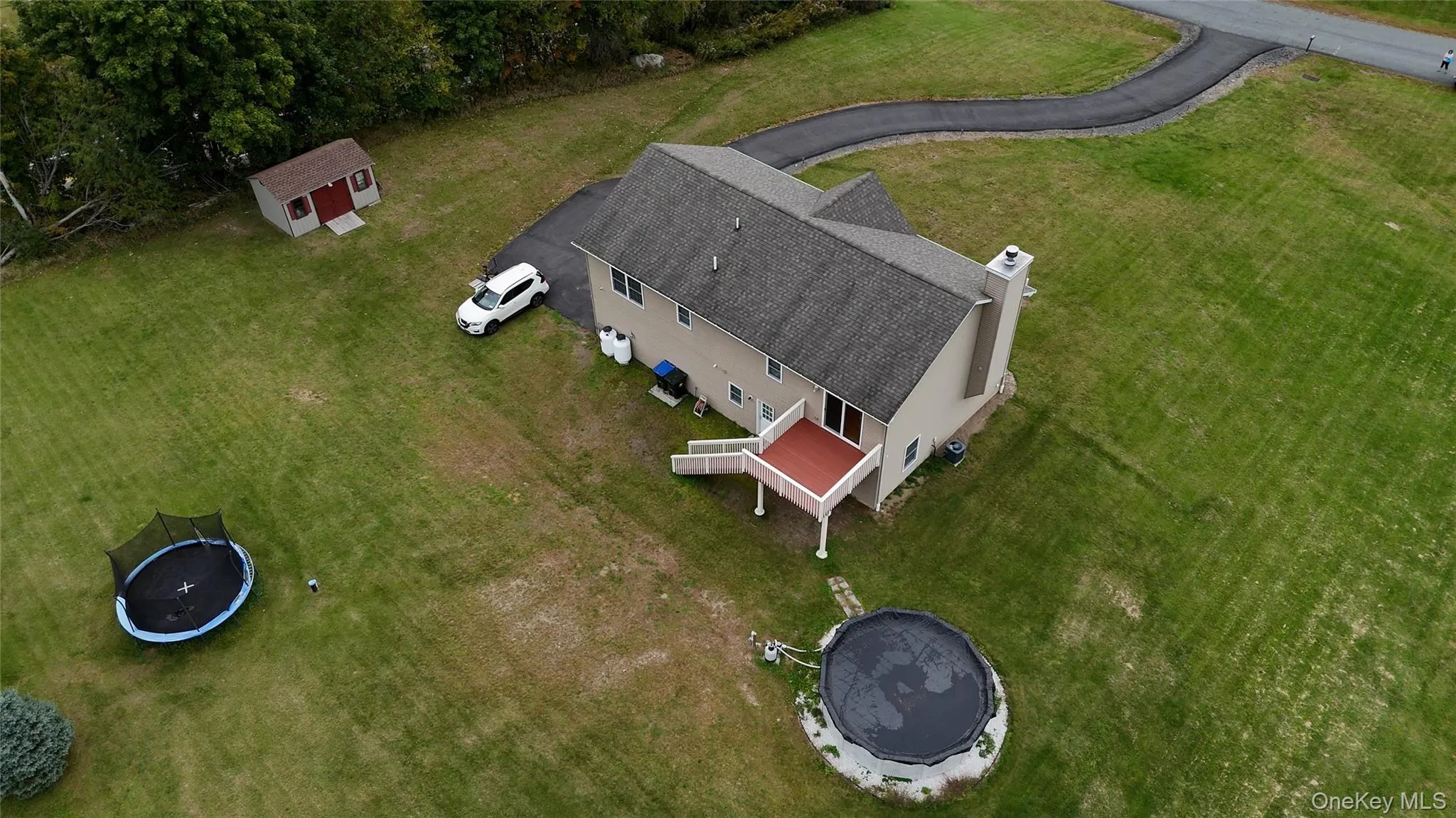 Full aerial view of the property Full aerial view of the property