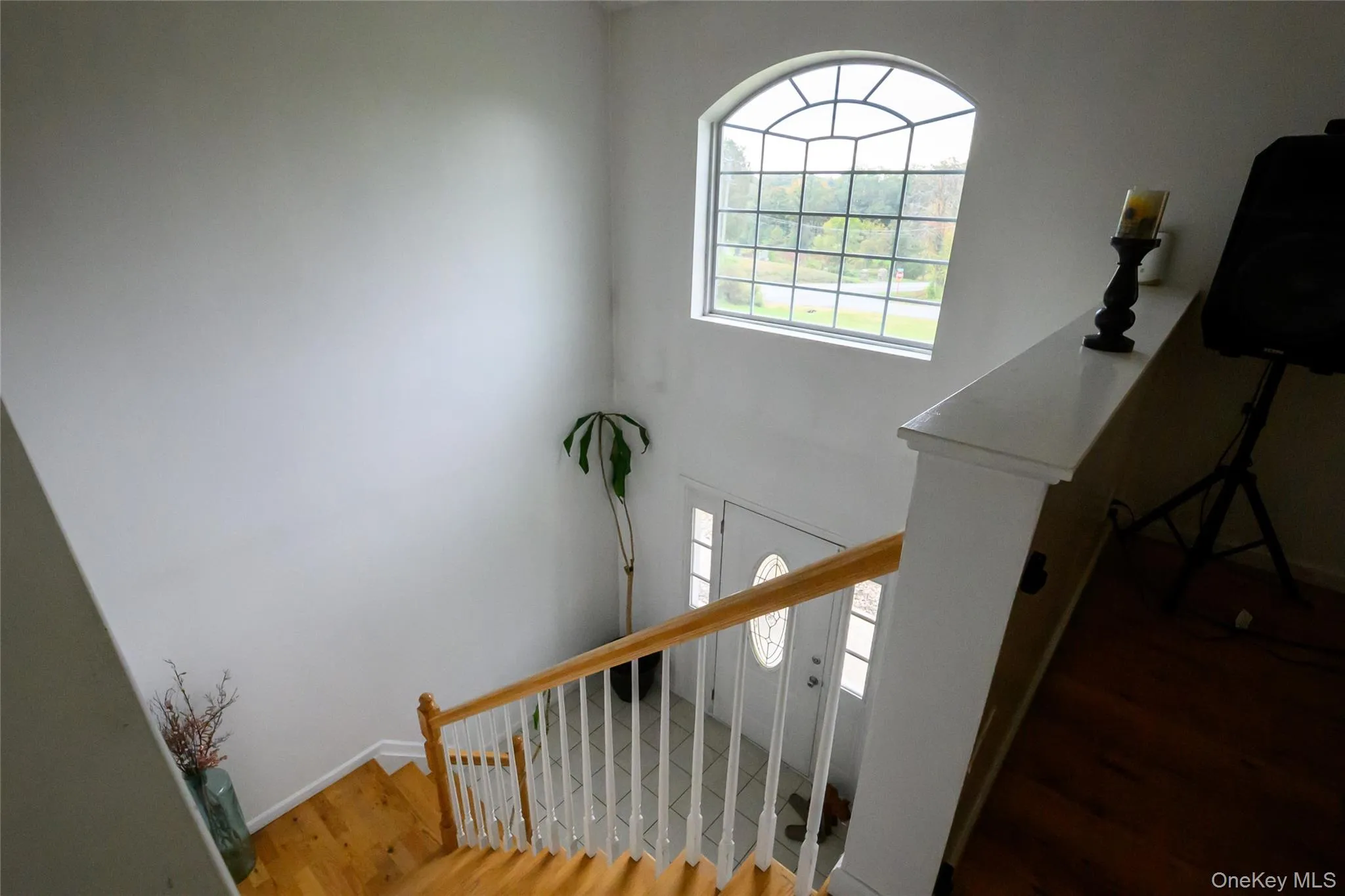 Entrance foyer with stairs to the main living area Entrance foyer with stairs to the main living area