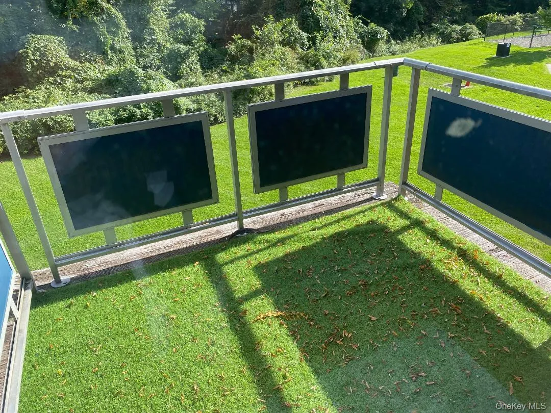 Your own private balcony overlooking a large grassy area with mature trees Your own private balcony overlooking a large grassy area with mature trees