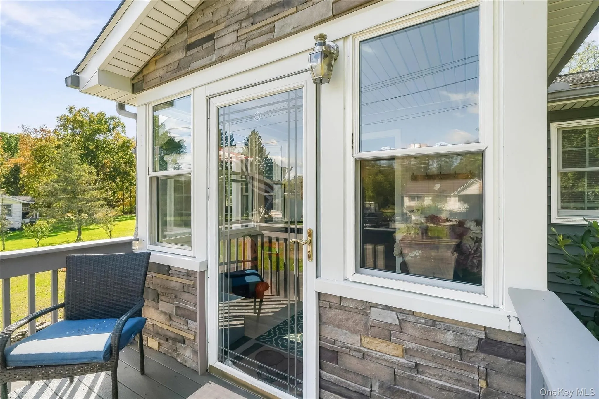 Front Deck leading to enclosed porch Front Deck leading to enclosed porch