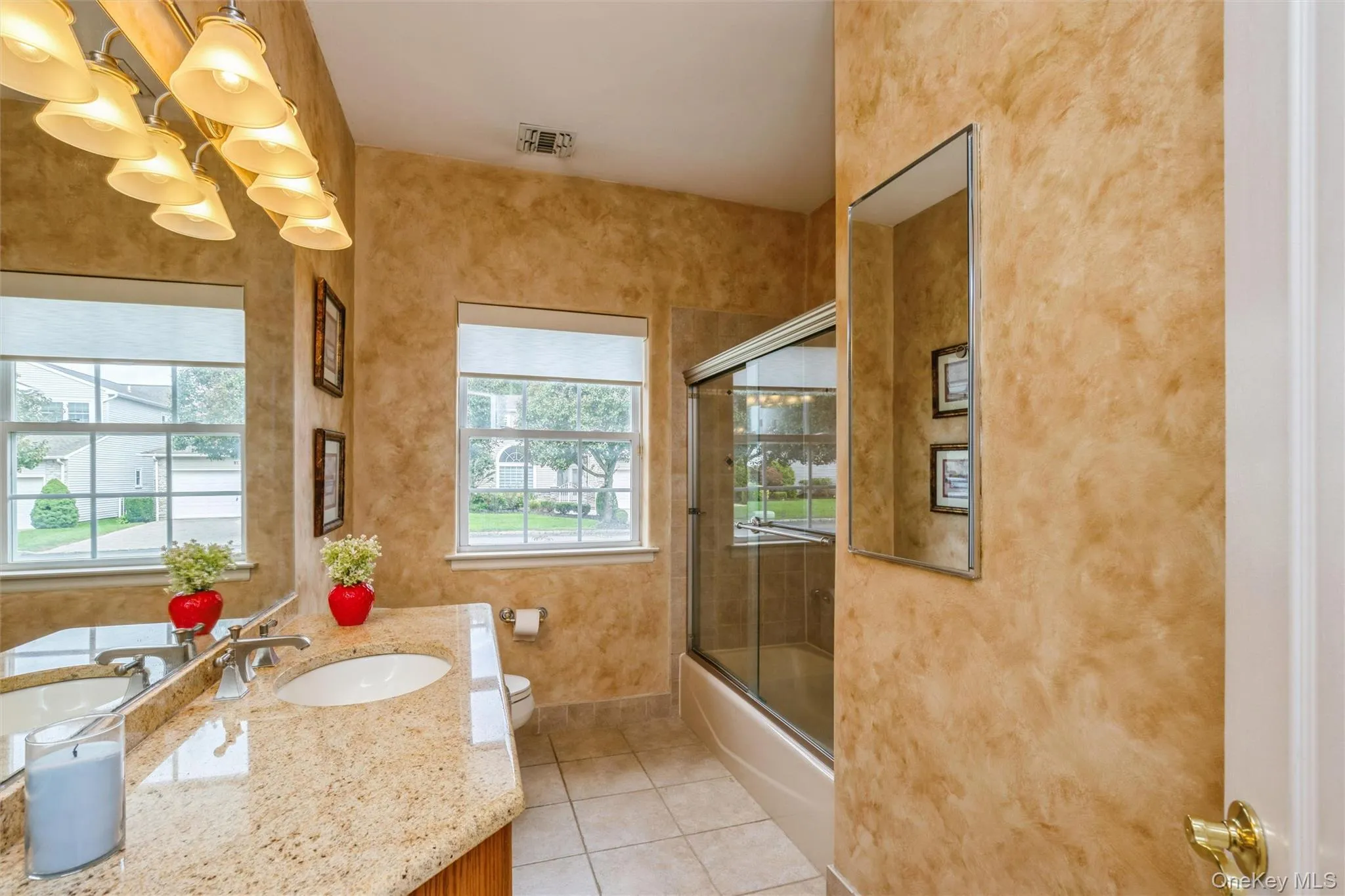 Hall Bathroom with Tub and Vanity with Granite Counters Hall Bathroom with Tub and Vanity with Granite Counters