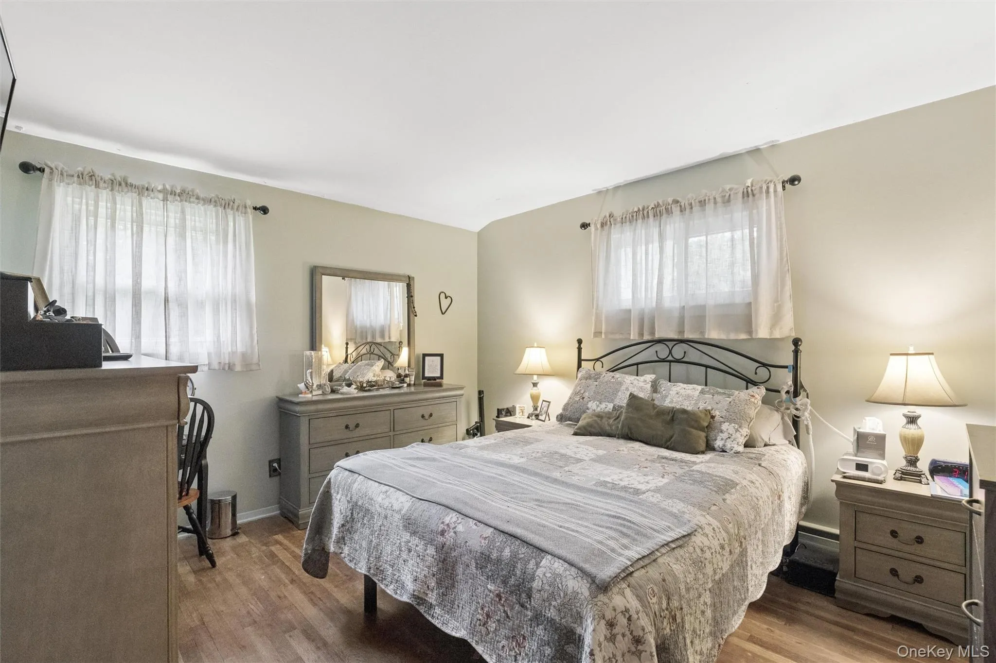 Primary Bedroom with 2 windows closet and view of backyard Primary Bedroom with 2 windows closet and view of backyard