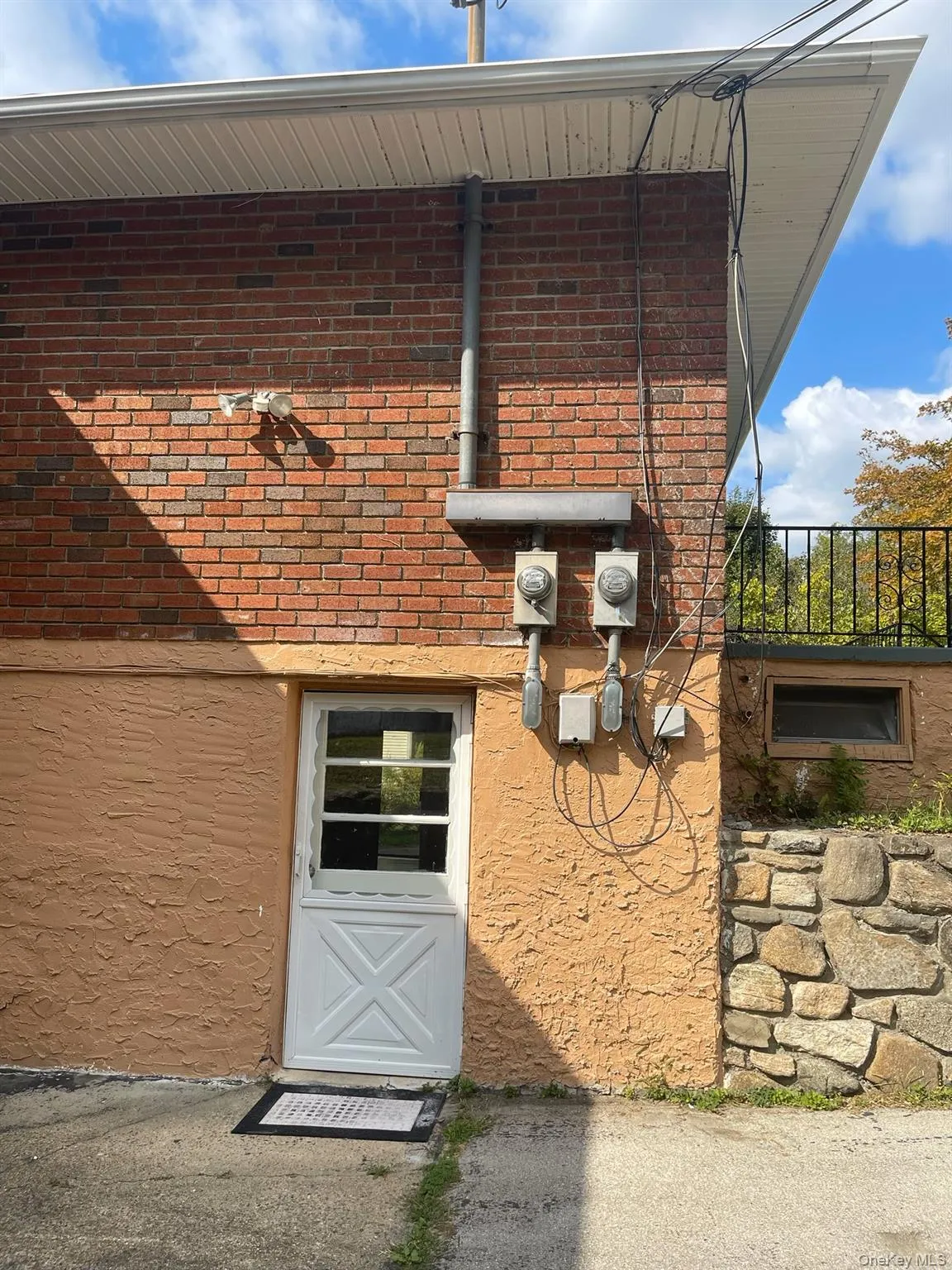 Property entrance with brick siding-Apartment Property entrance with brick siding-Apartment