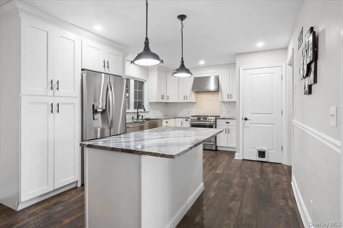 Updated kitchen with a large island Updated kitchen with a large island