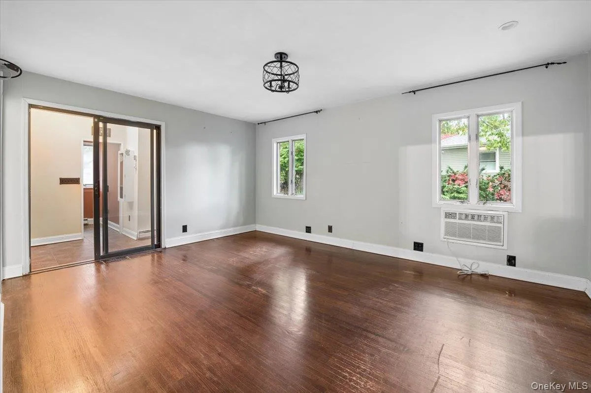 Primary bedroom leads to laundry, a walk-in closet and additional pool access. Primary bedroom leads to laundry, a walk-in closet and additional pool access.