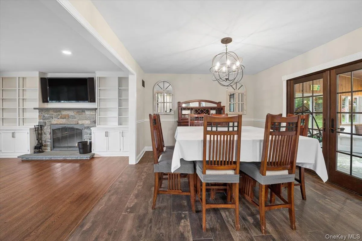 Living room flows easily into dining and kitchen Living room flows easily into dining and kitchen