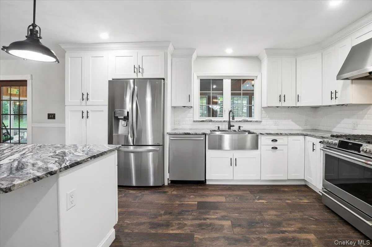 Kitchen with stainless steel appliance. Kitchen with stainless steel appliance.