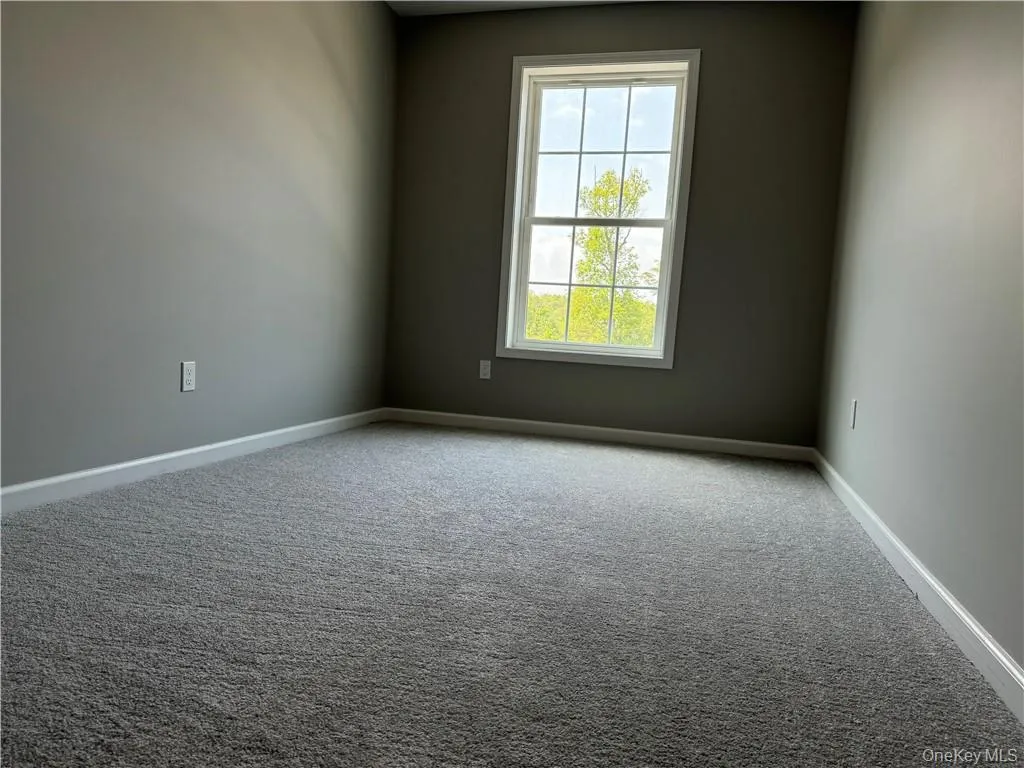 View of carpeted spare room View of carpeted spare room