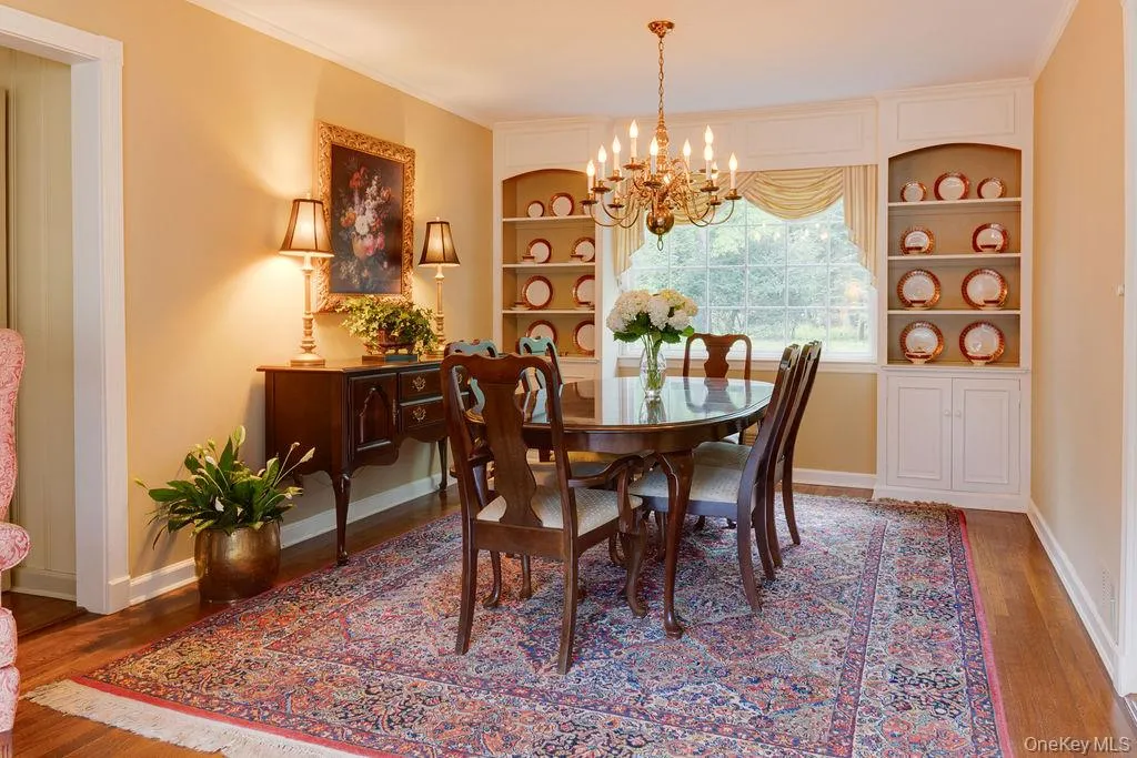 Formal dining room with built-in shelves and cabinets Formal dining room with built-in shelves and cabinets