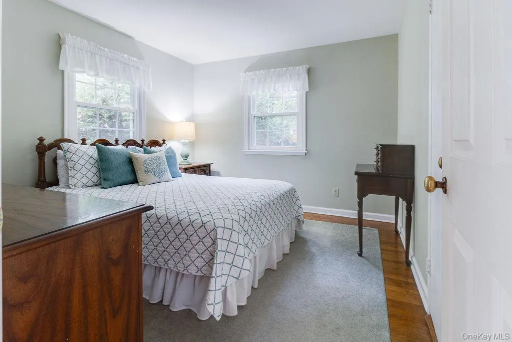 Second bedroom with hardwood floors Second bedroom with hardwood floors