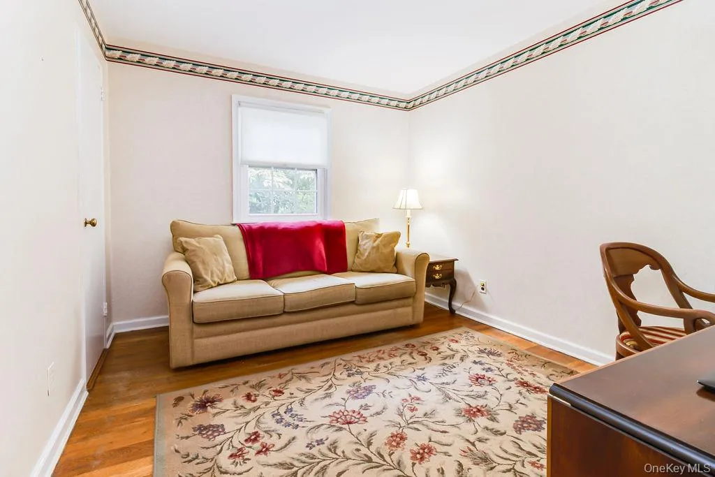 Third bedroom with hardwood floors Third bedroom with hardwood floors
