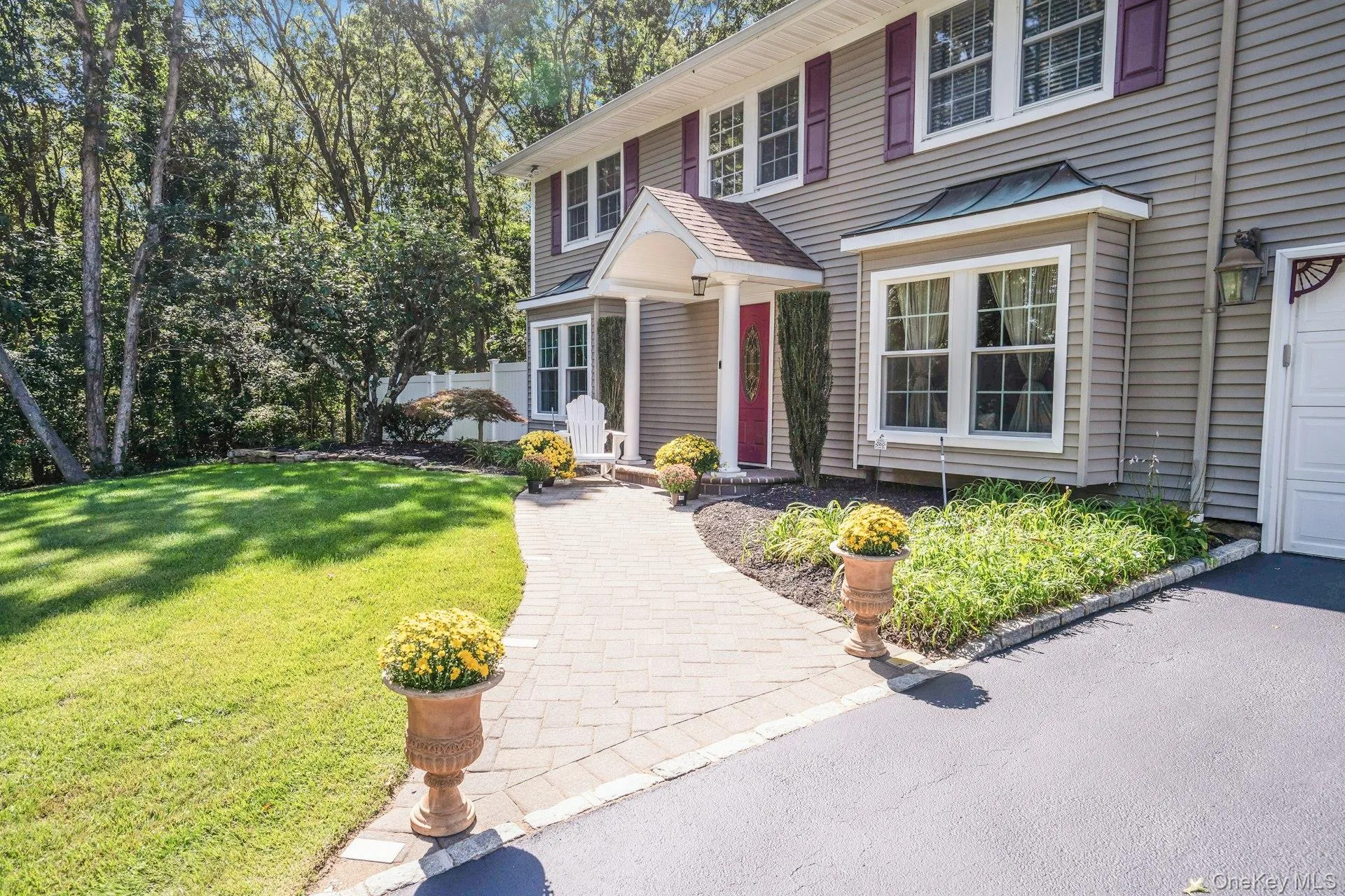 Professionally landscaped with specimen trees and gardens. Professionally landscaped with specimen trees and gardens.