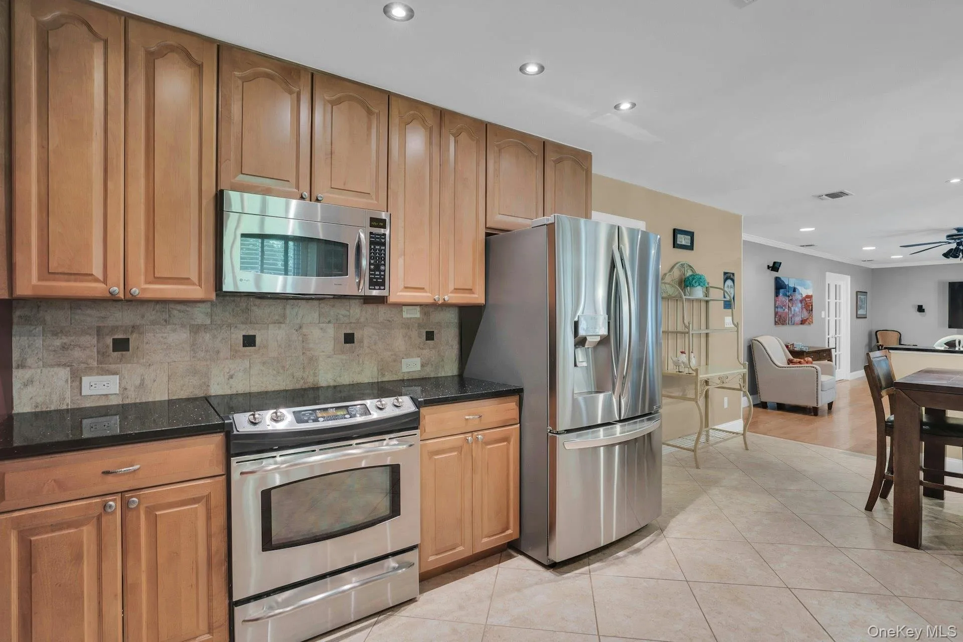 Custom wood cabinets and stainless appliances. Custom wood cabinets and stainless appliances.