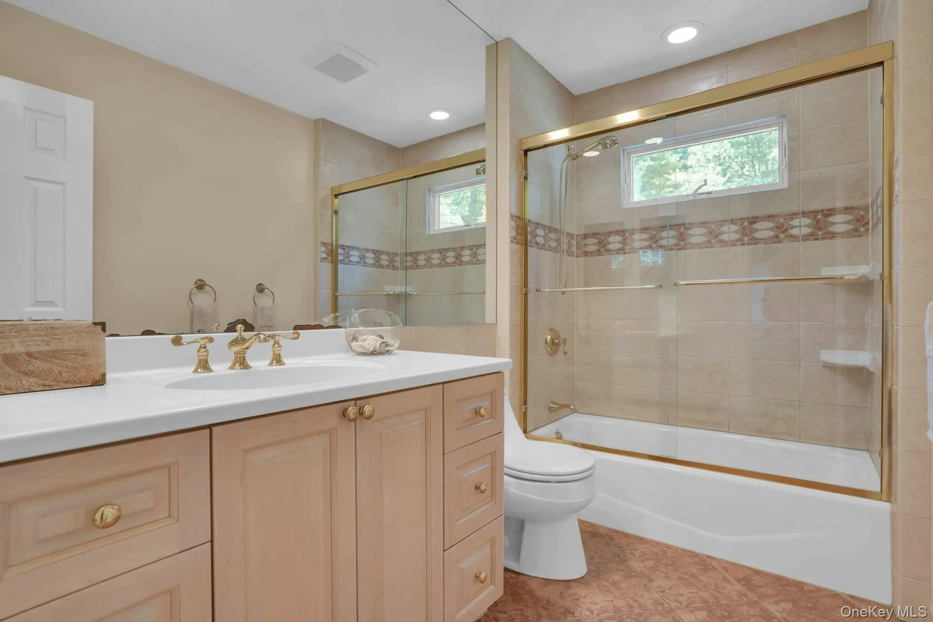 Main bathroom in hallway. Main bathroom in hallway.