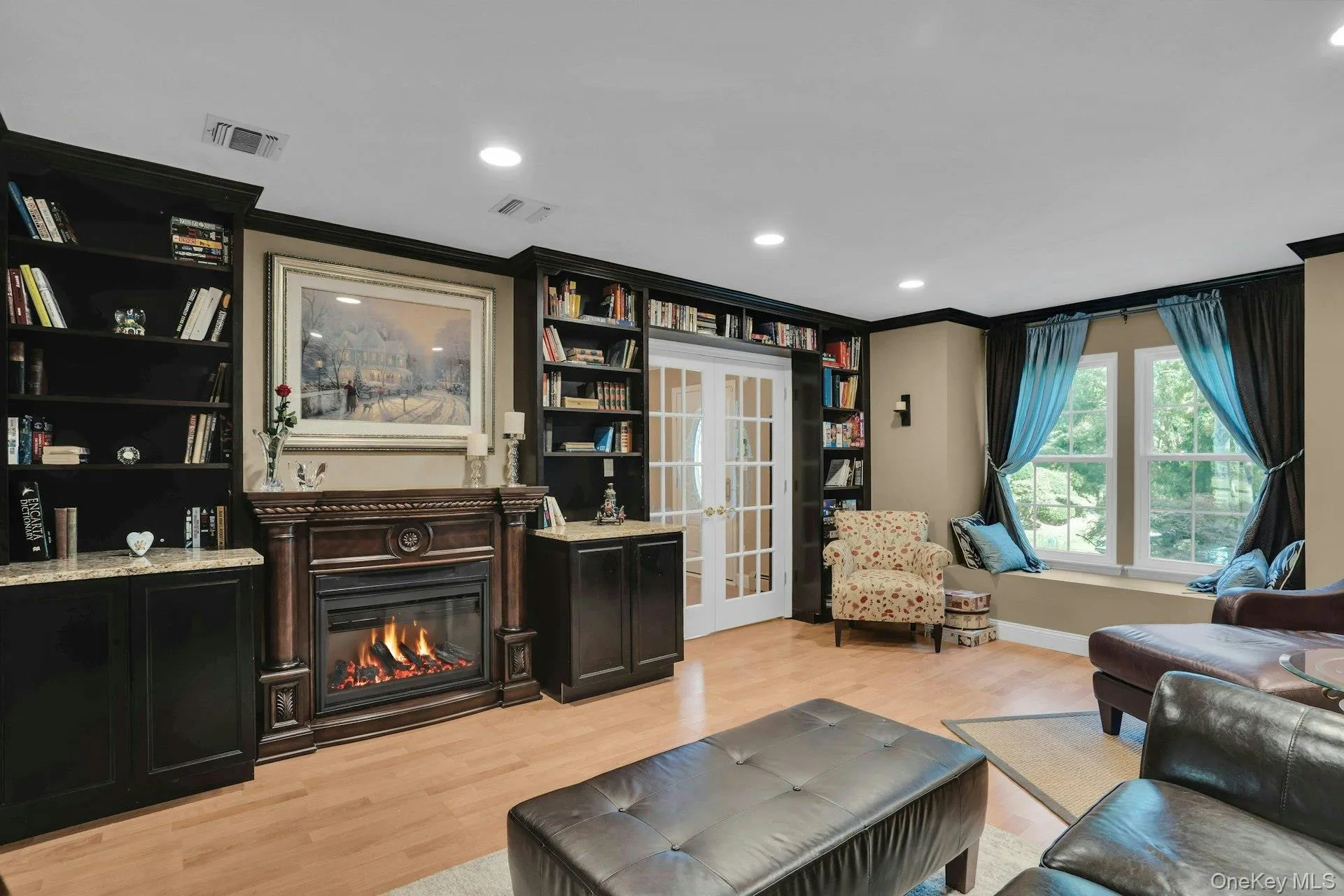 Rich wood bookshelves are elegant. Rich wood bookshelves are elegant.