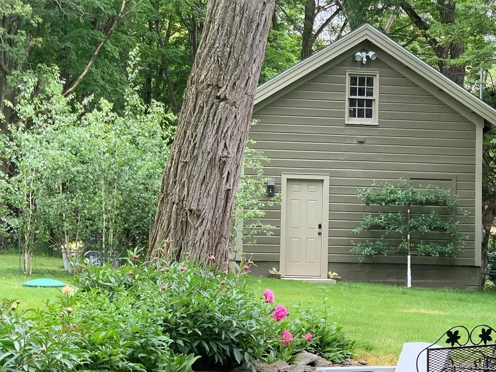 Back of property with a lawn Back of property with a lawn