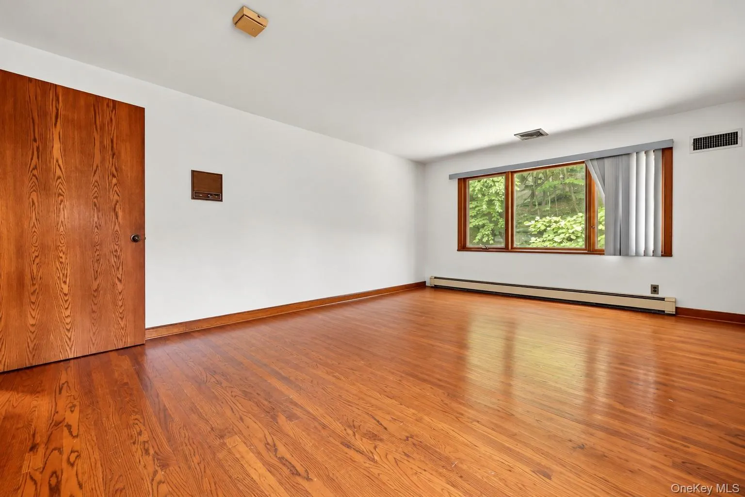 BR 2. Oversized windows. Wood floors. Extraneous objects removed from photo. BR 2. Oversized windows. Wood floors. Extraneous objects removed from photo.